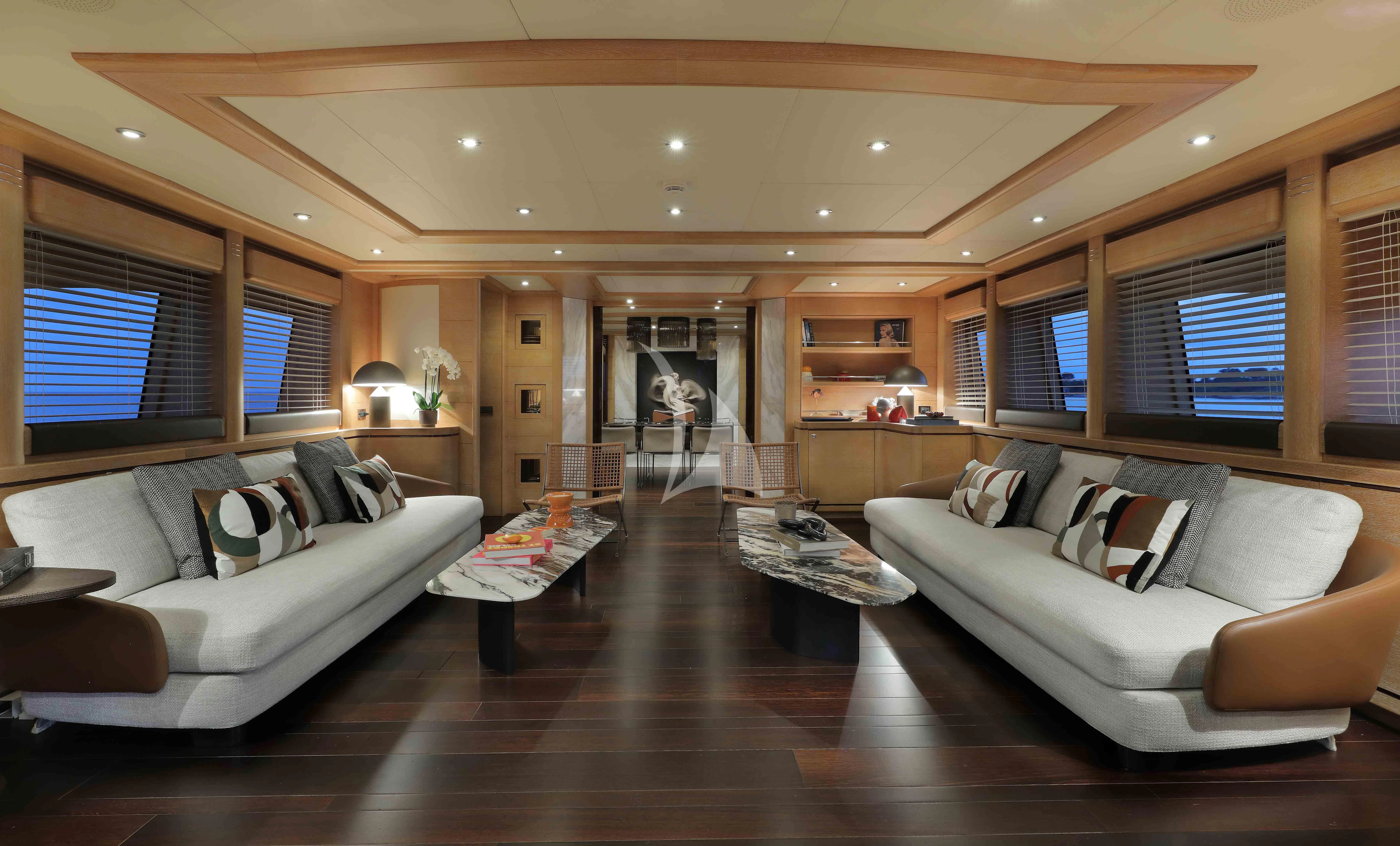 a living room with a large open floor plan aboard AERO Yacht for Charter
