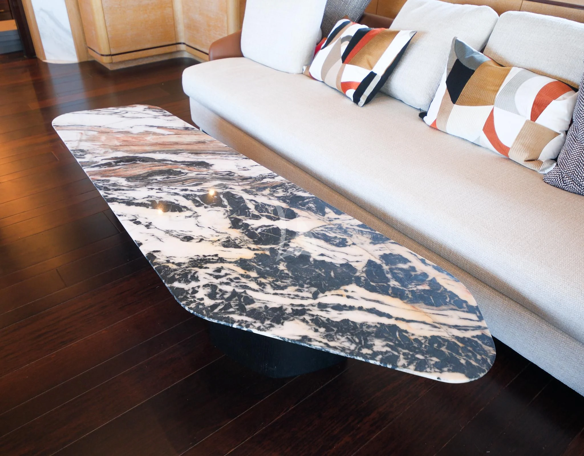 a couch and a table aboard AERO Yacht for Charter