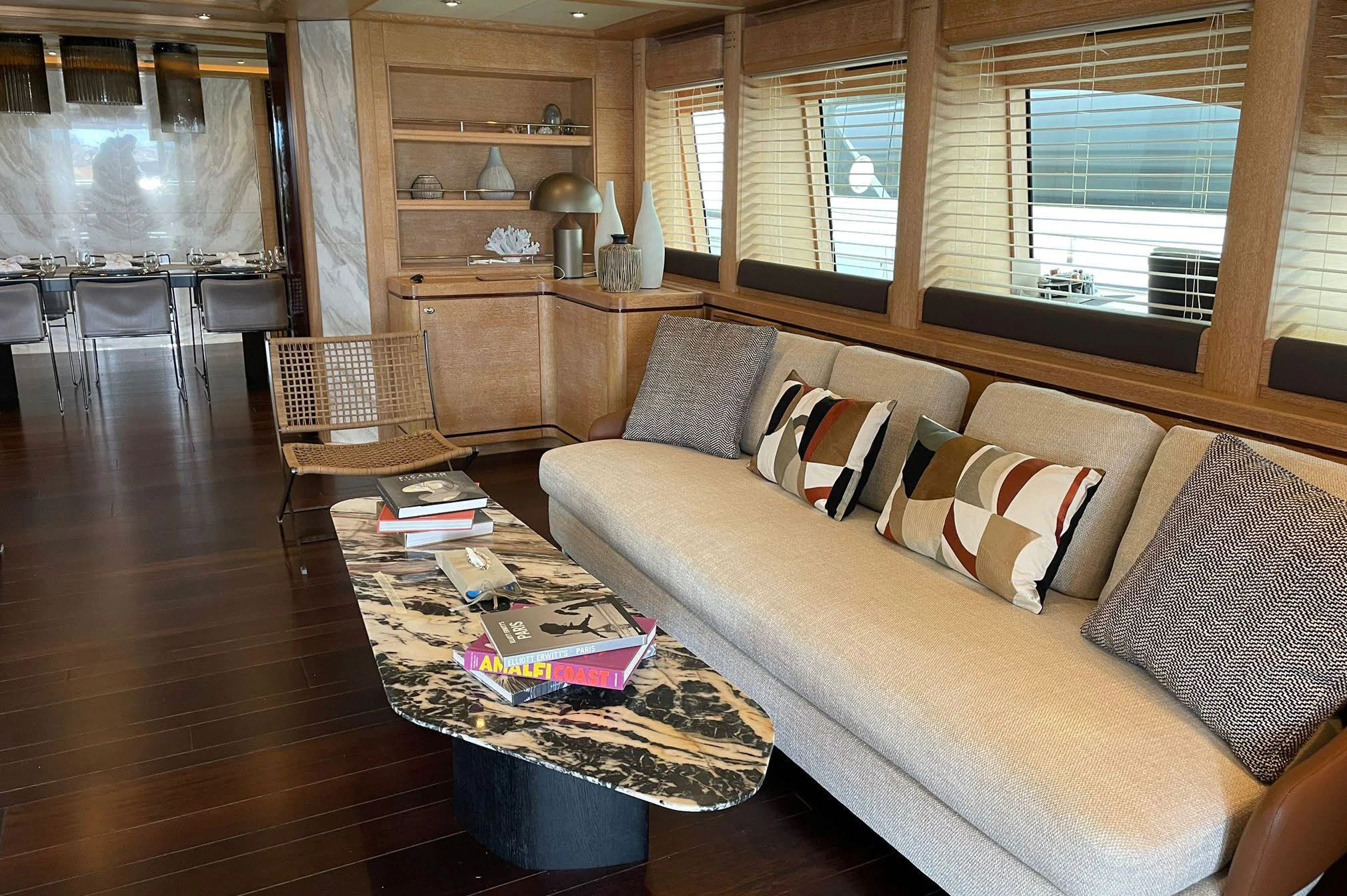 a living room with a couch and a coffee table aboard AERO Yacht for Charter