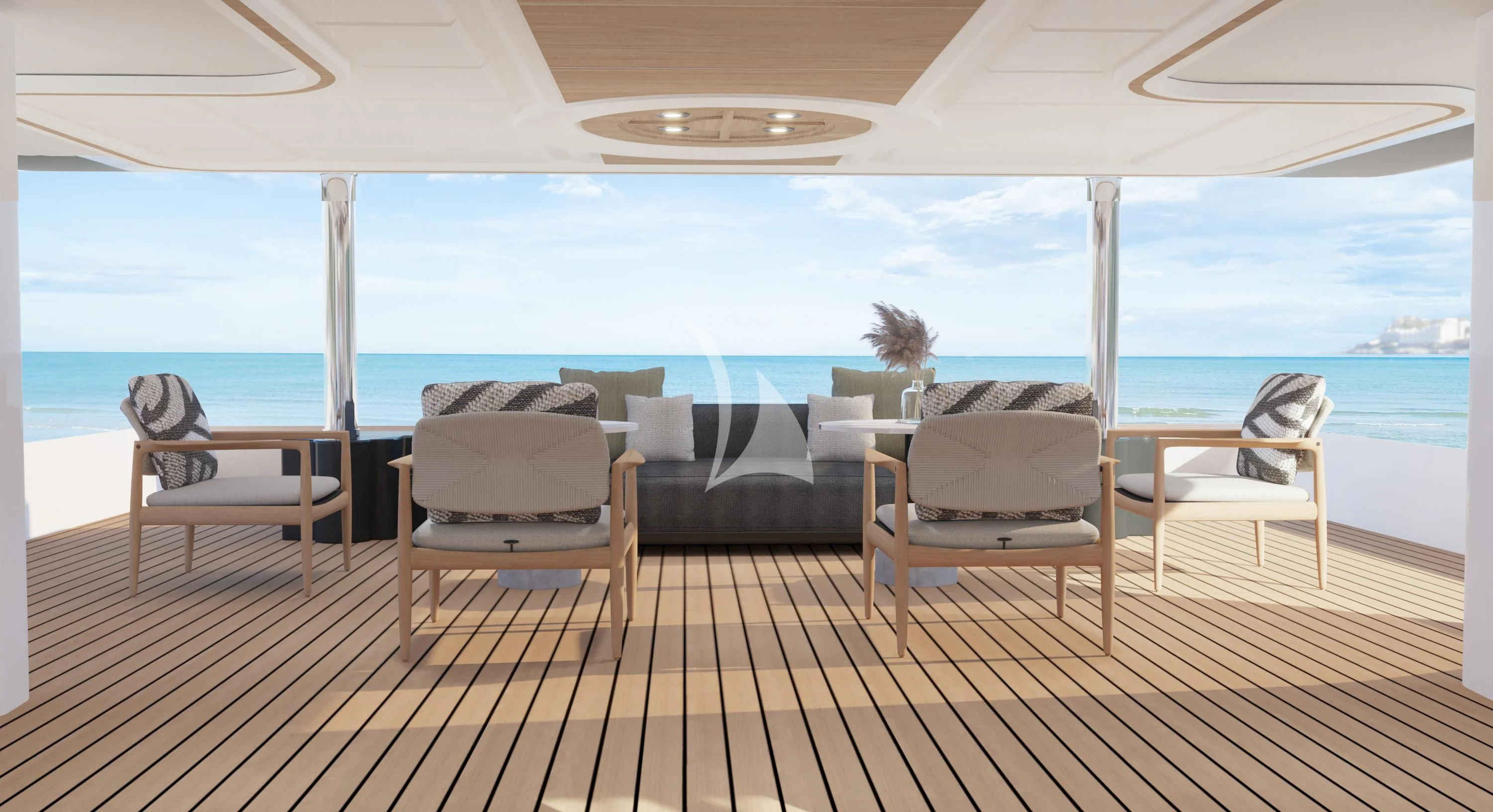 a deck with chairs and a large body of water in the background aboard AERO Yacht for Charter