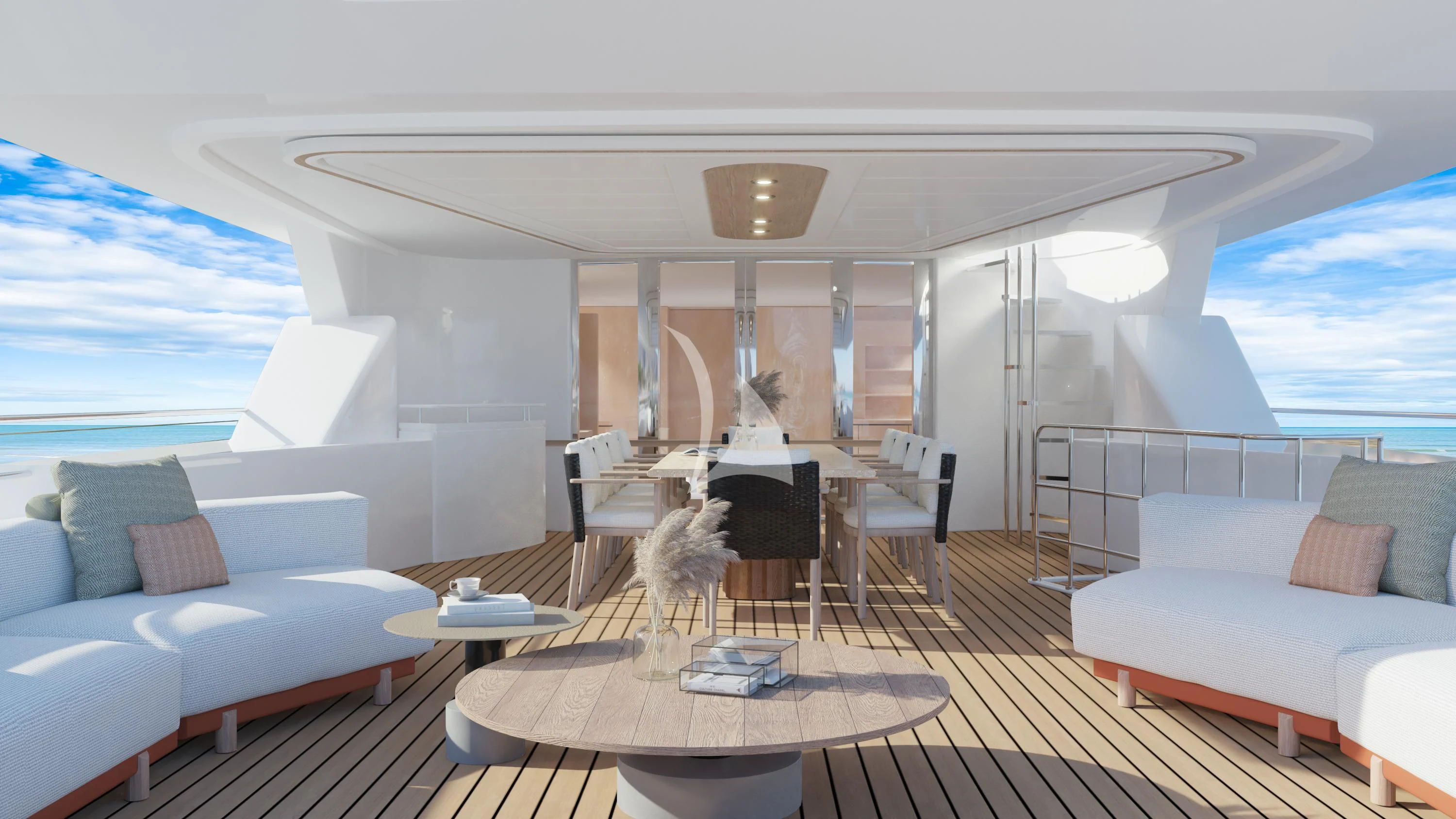 a living room with a large white sofa and a large white bed aboard AERO Yacht for Charter