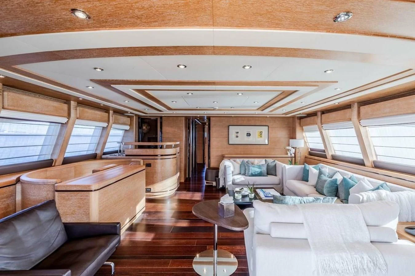 a living room with a large window aboard AERO Yacht for Charter