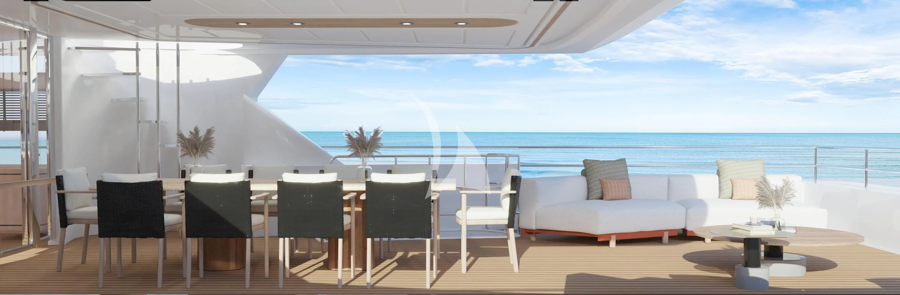 a large room with a couch and chairs and a large body of water aboard AERO Yacht for Charter