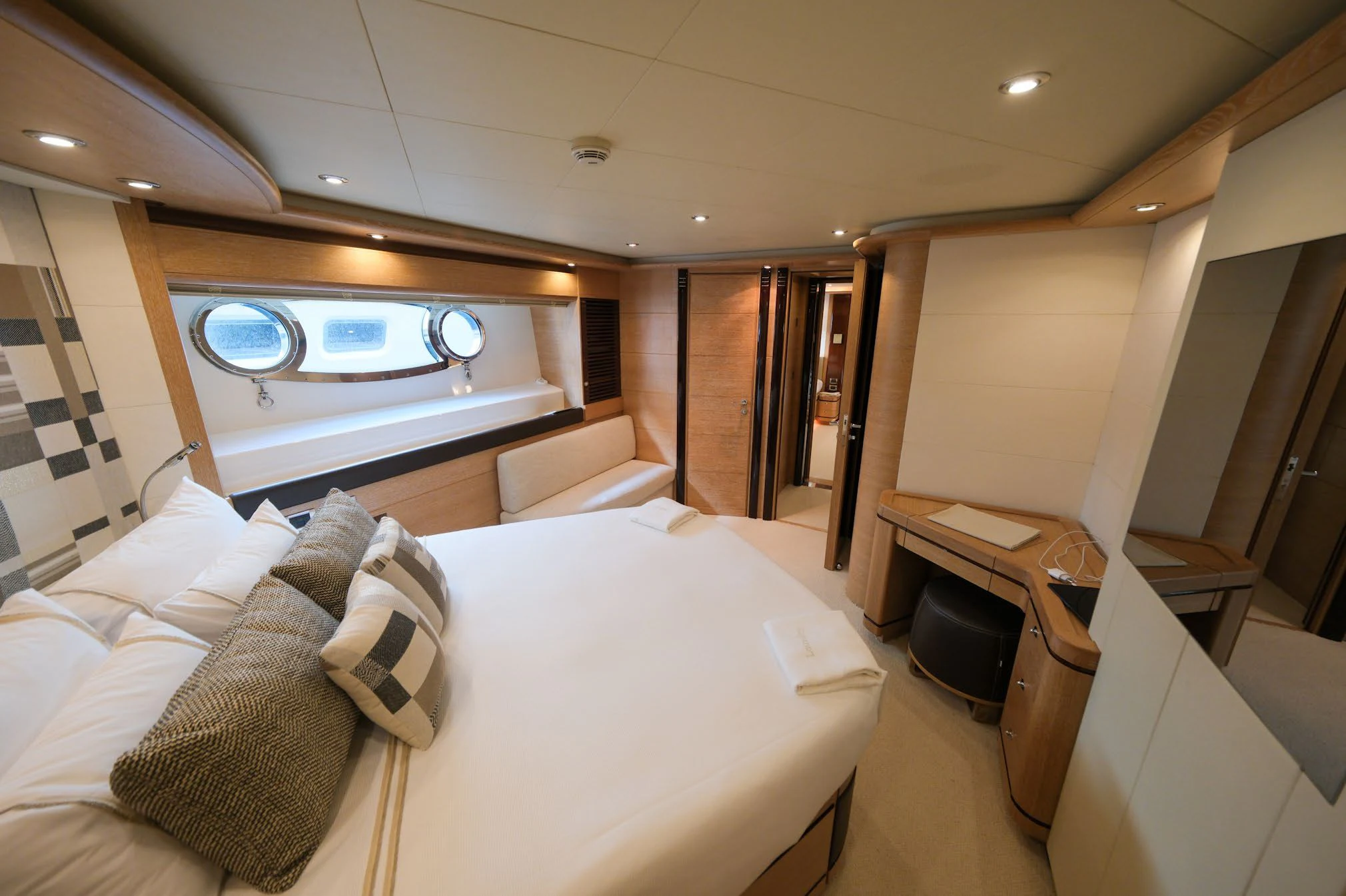 a hotel room with a bed aboard AERO Yacht for Charter