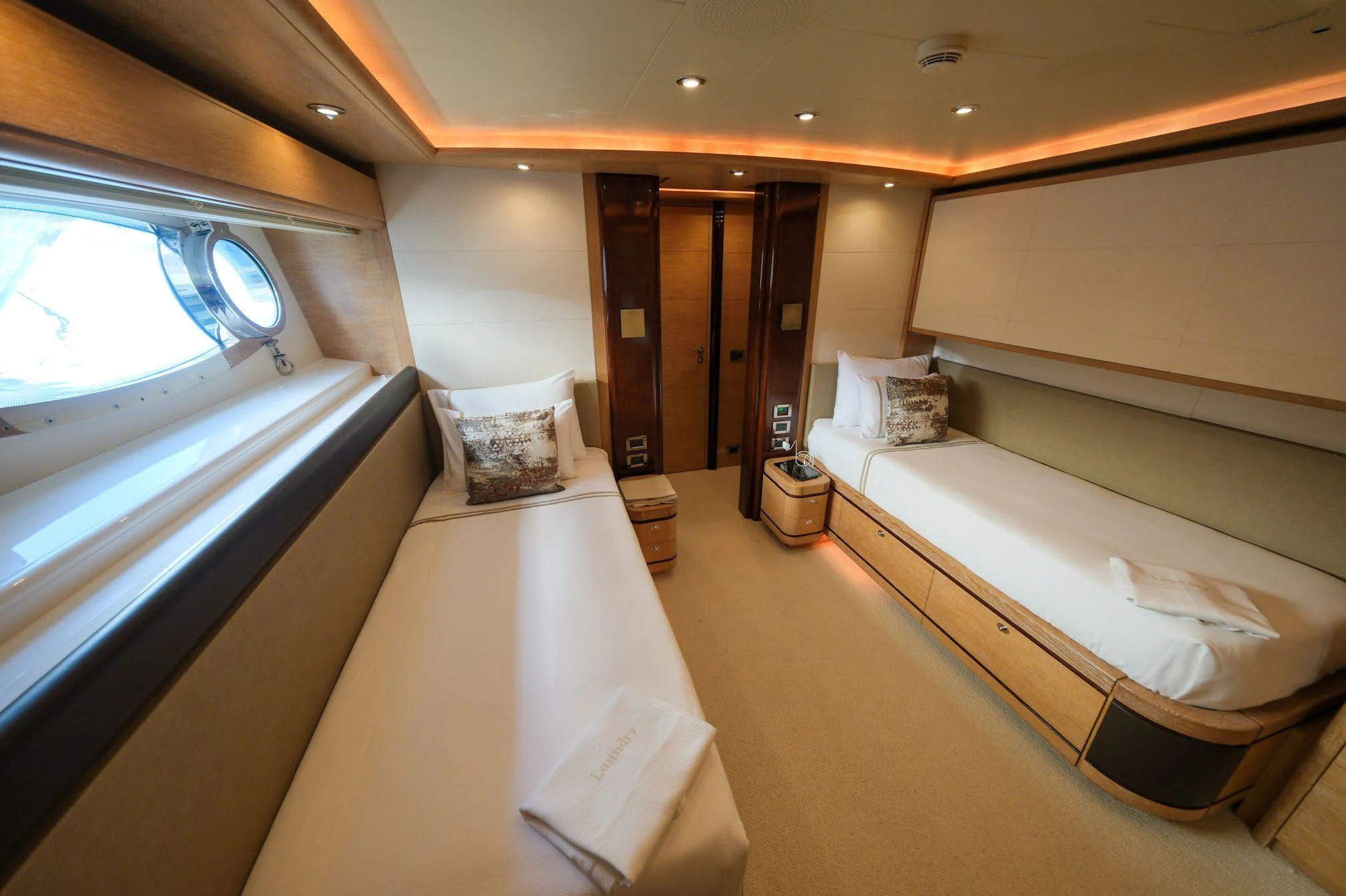 a room with two beds aboard AERO Yacht for Charter