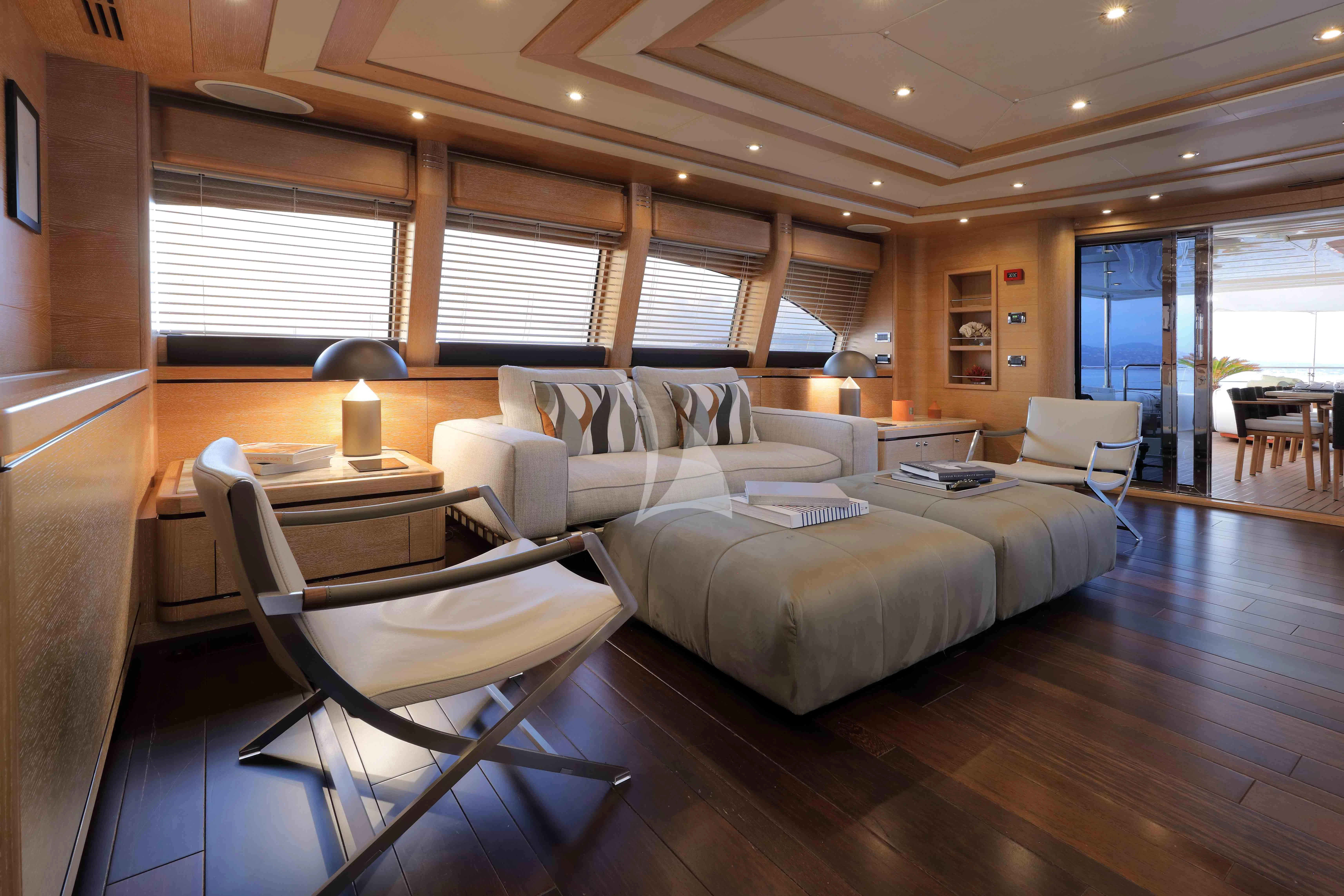 a bedroom with a bed and a desk aboard AERO Yacht for Charter