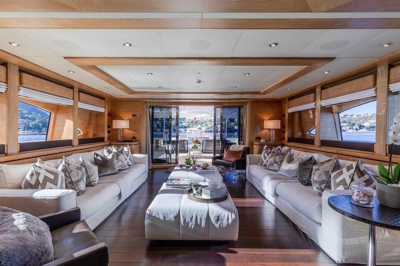 a living room with a large window aboard AERO Yacht for Charter