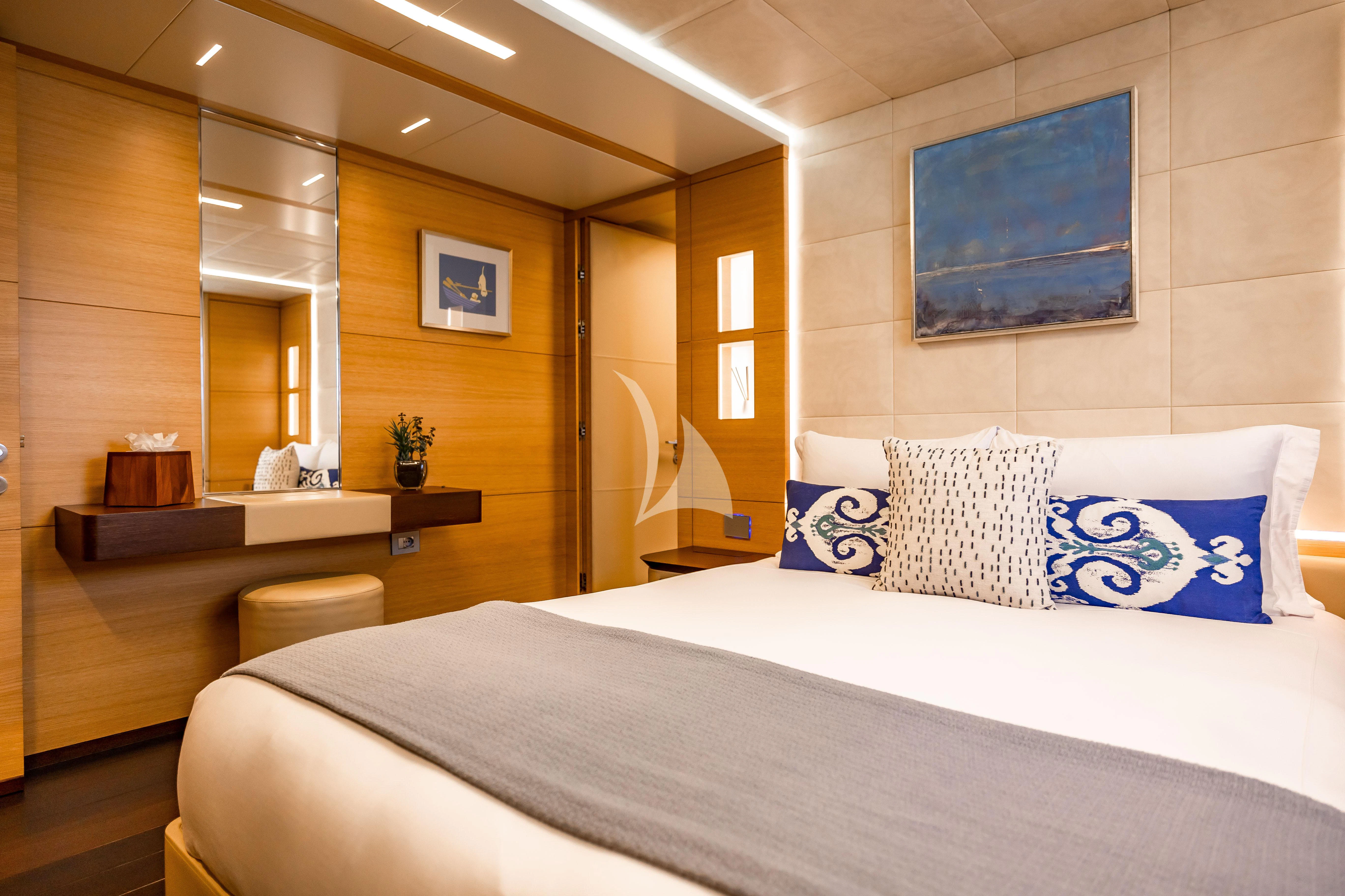 a hotel room with a bed aboard PATIENCE Yacht for Charter