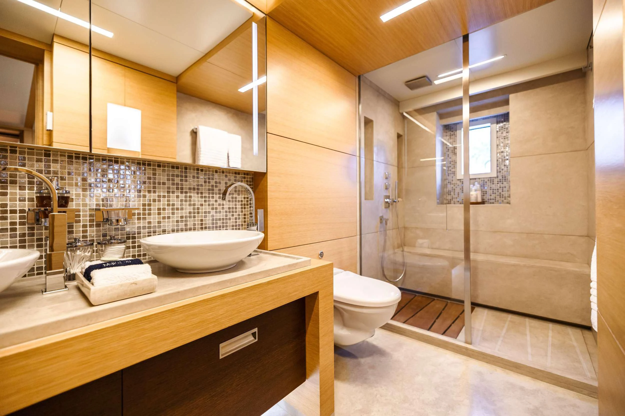 a bathroom with a sink and a toilet aboard PATIENCE Yacht for Charter