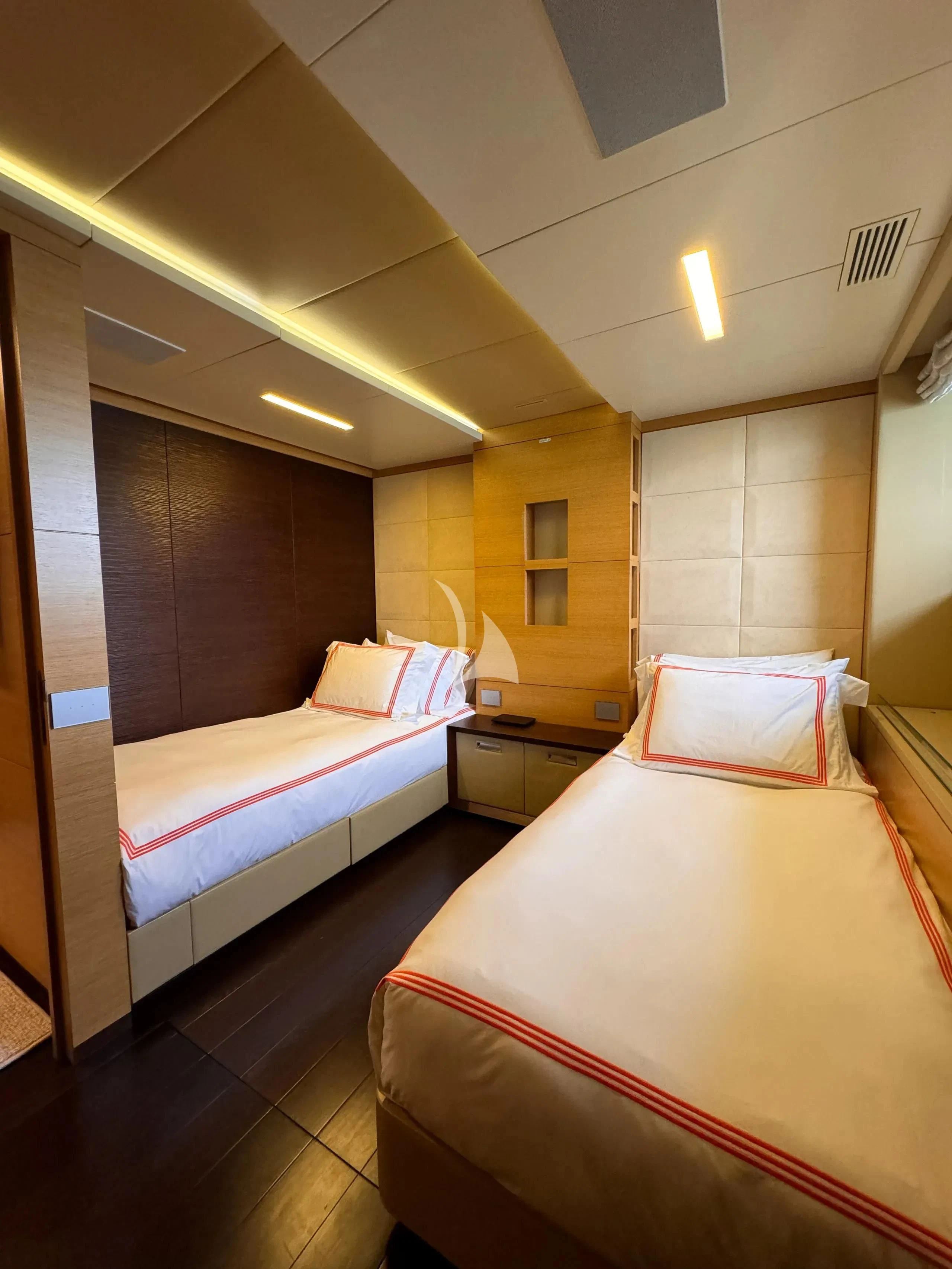 a bedroom with a bed aboard PATIENCE Yacht for Charter