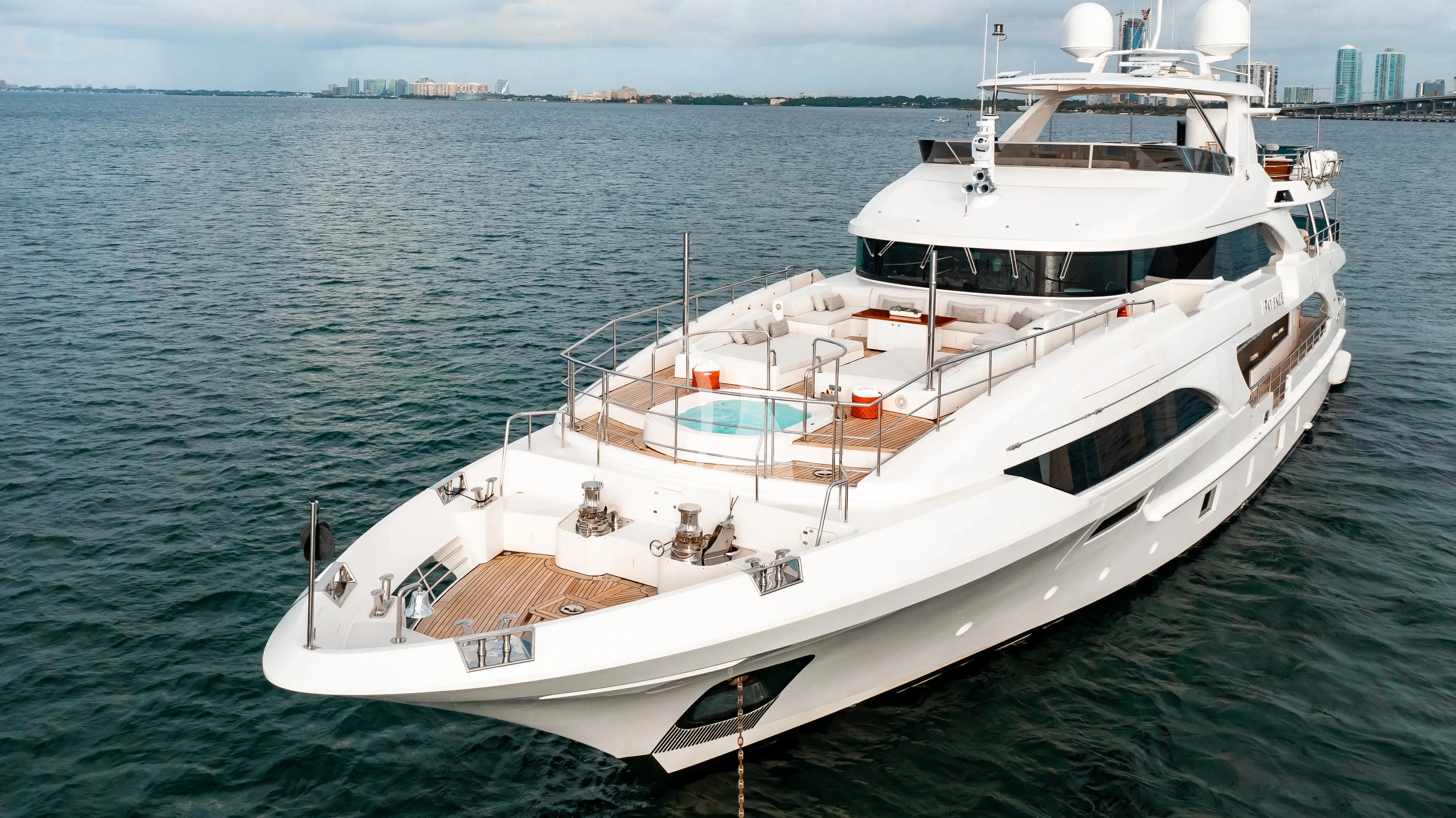 a white boat in the water aboard PATIENCE Yacht for Charter