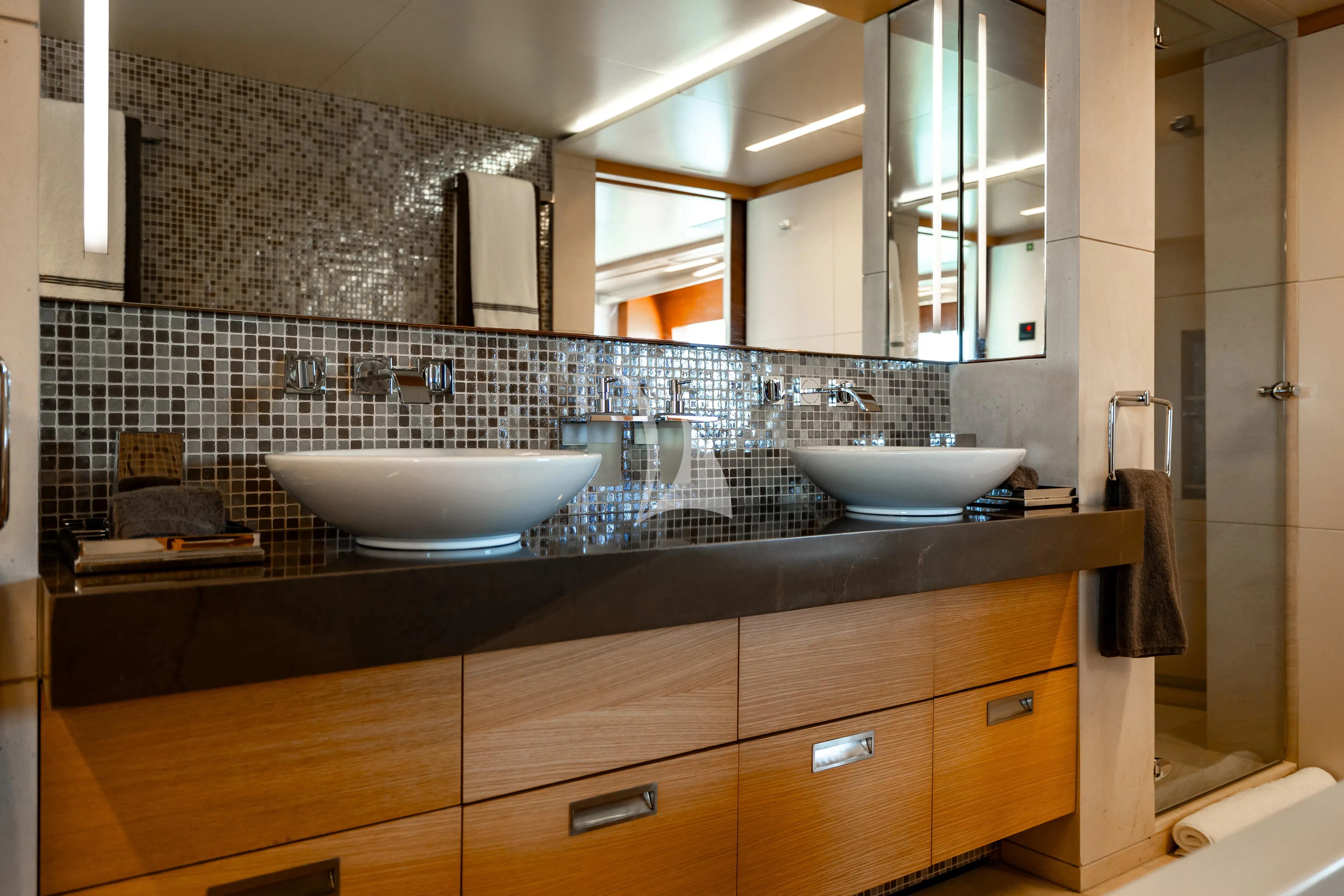 a bathroom with two sinks aboard PATIENCE Yacht for Charter