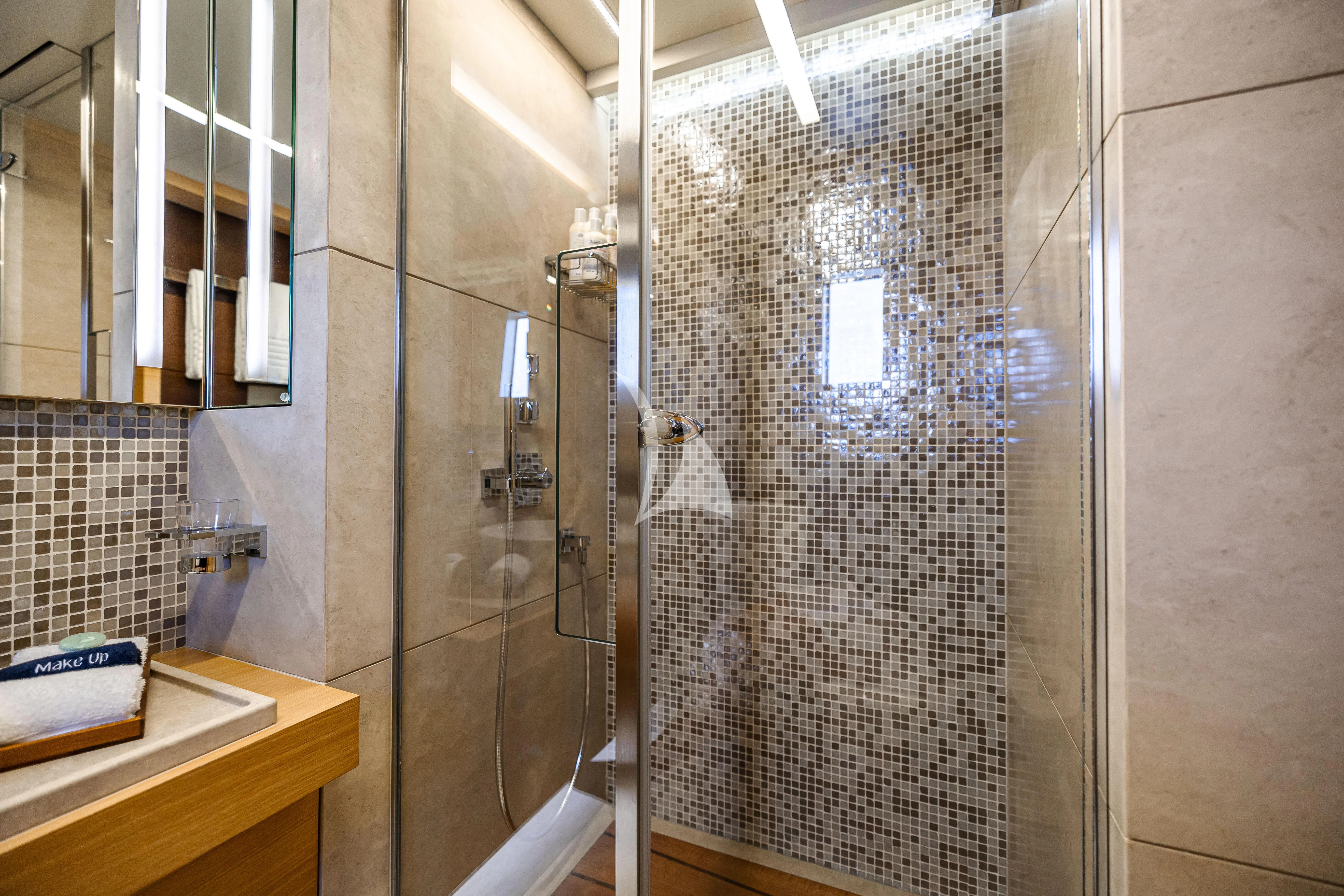 a shower unit in a bathroom aboard PATIENCE Yacht for Charter