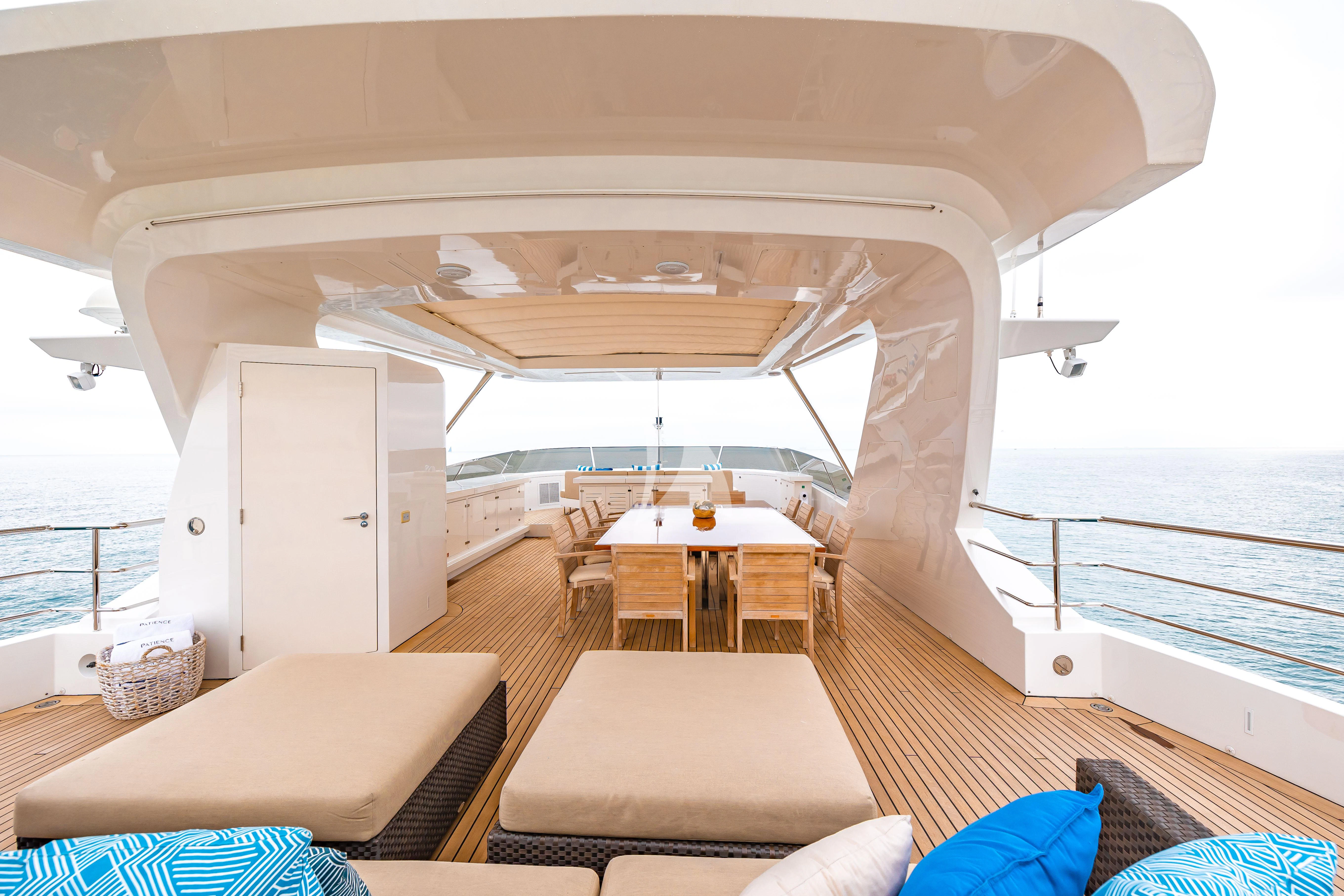 a room with a table and chairs aboard PATIENCE Yacht for Charter