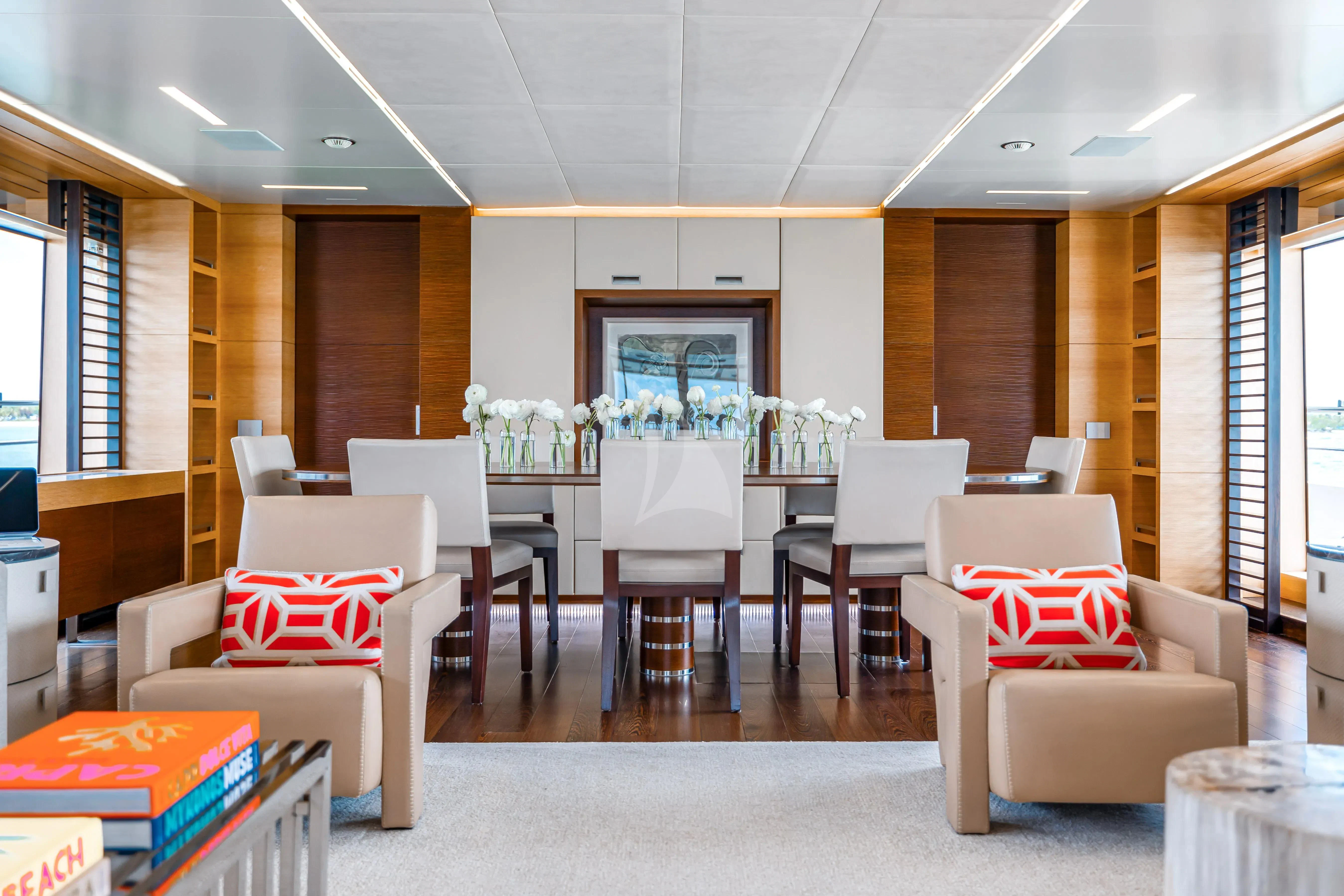 a room with chairs and tables aboard PATIENCE Yacht for Charter