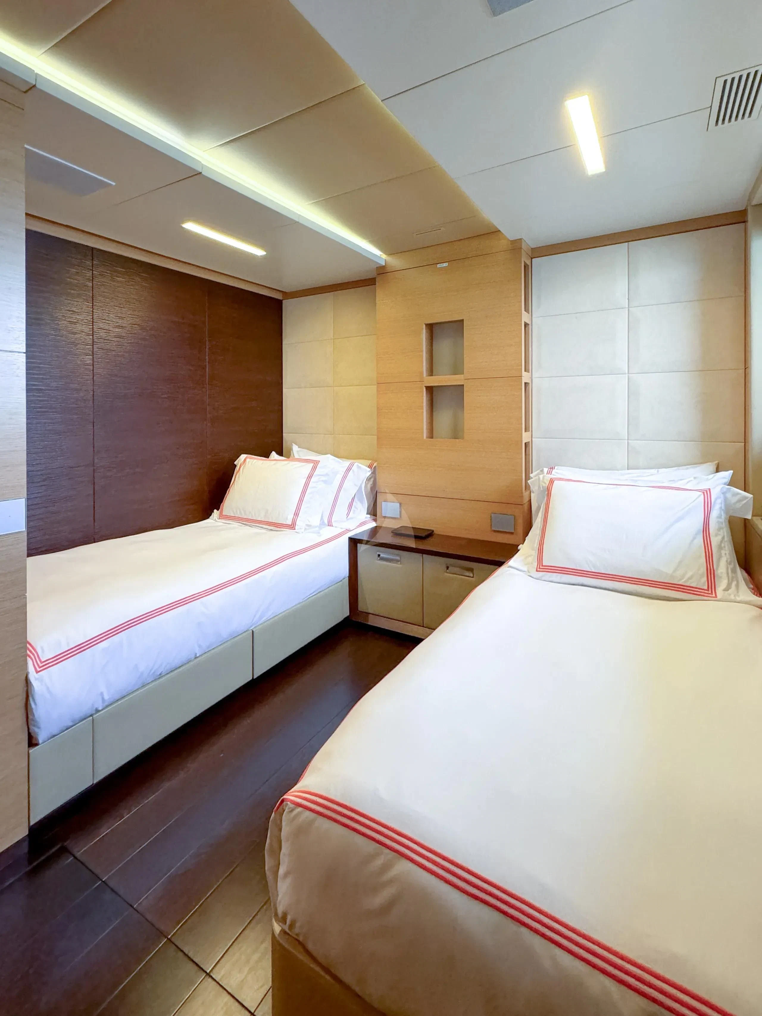 a couple of beds in a room aboard PATIENCE Yacht for Charter