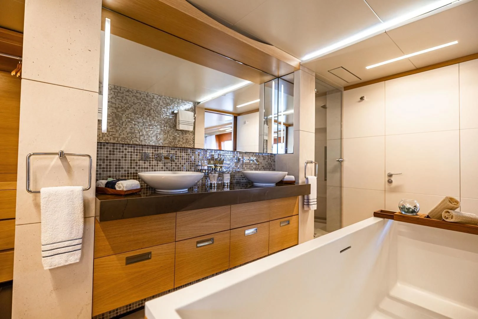 a bathroom with a large mirror aboard PATIENCE Yacht for Charter
