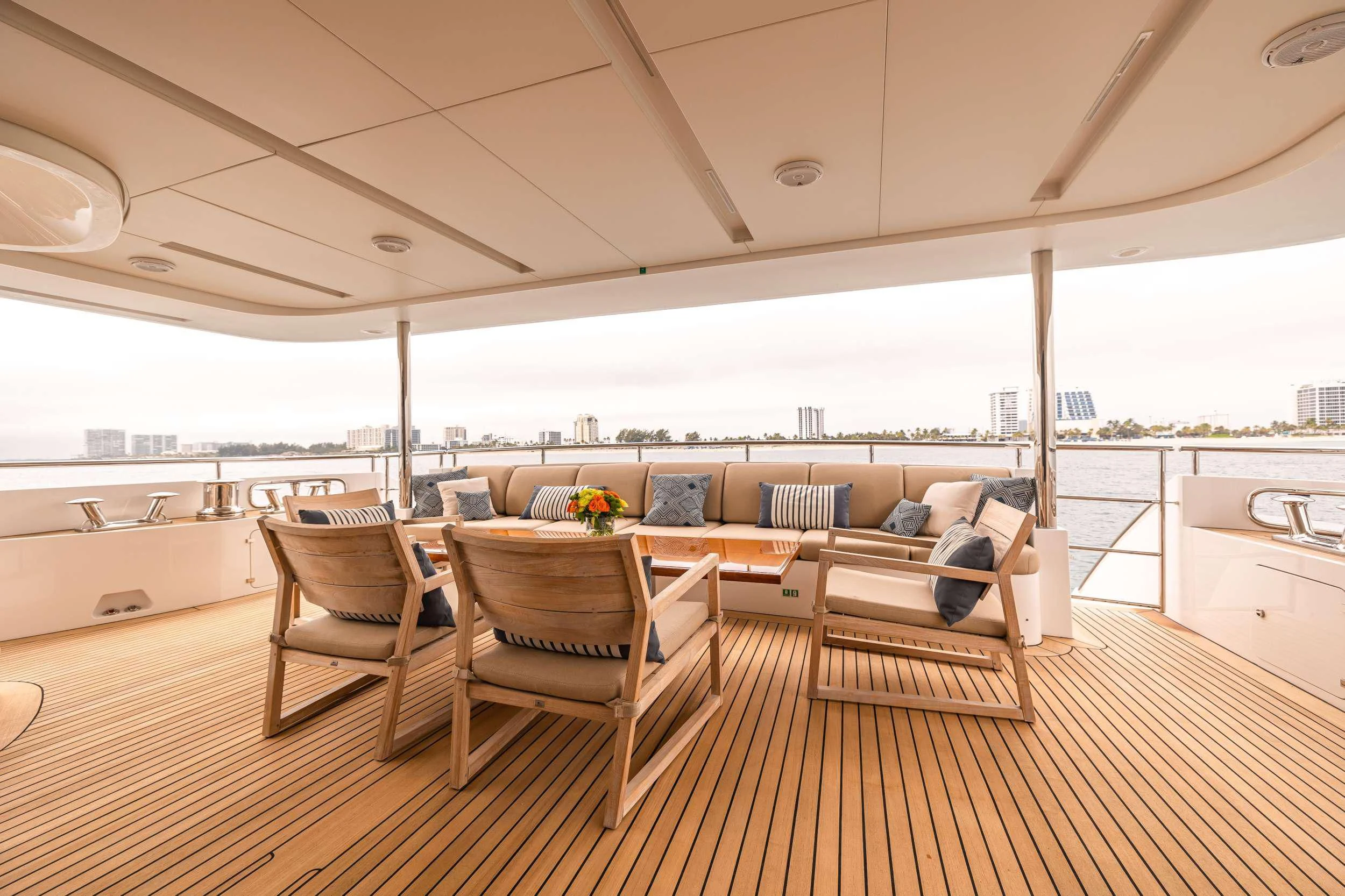 a large room with a table and chairs aboard PATIENCE Yacht for Charter