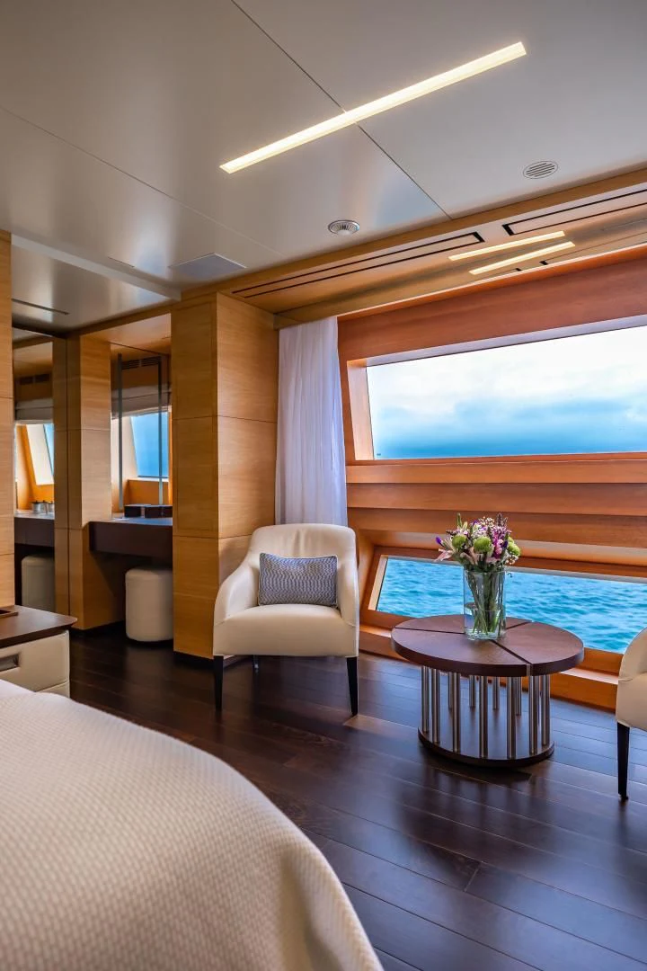 a room with a table and chairs aboard PATIENCE Yacht for Charter