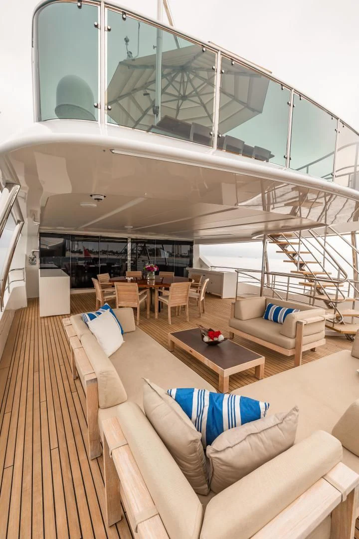 a living room with a large window aboard PATIENCE Yacht for Charter