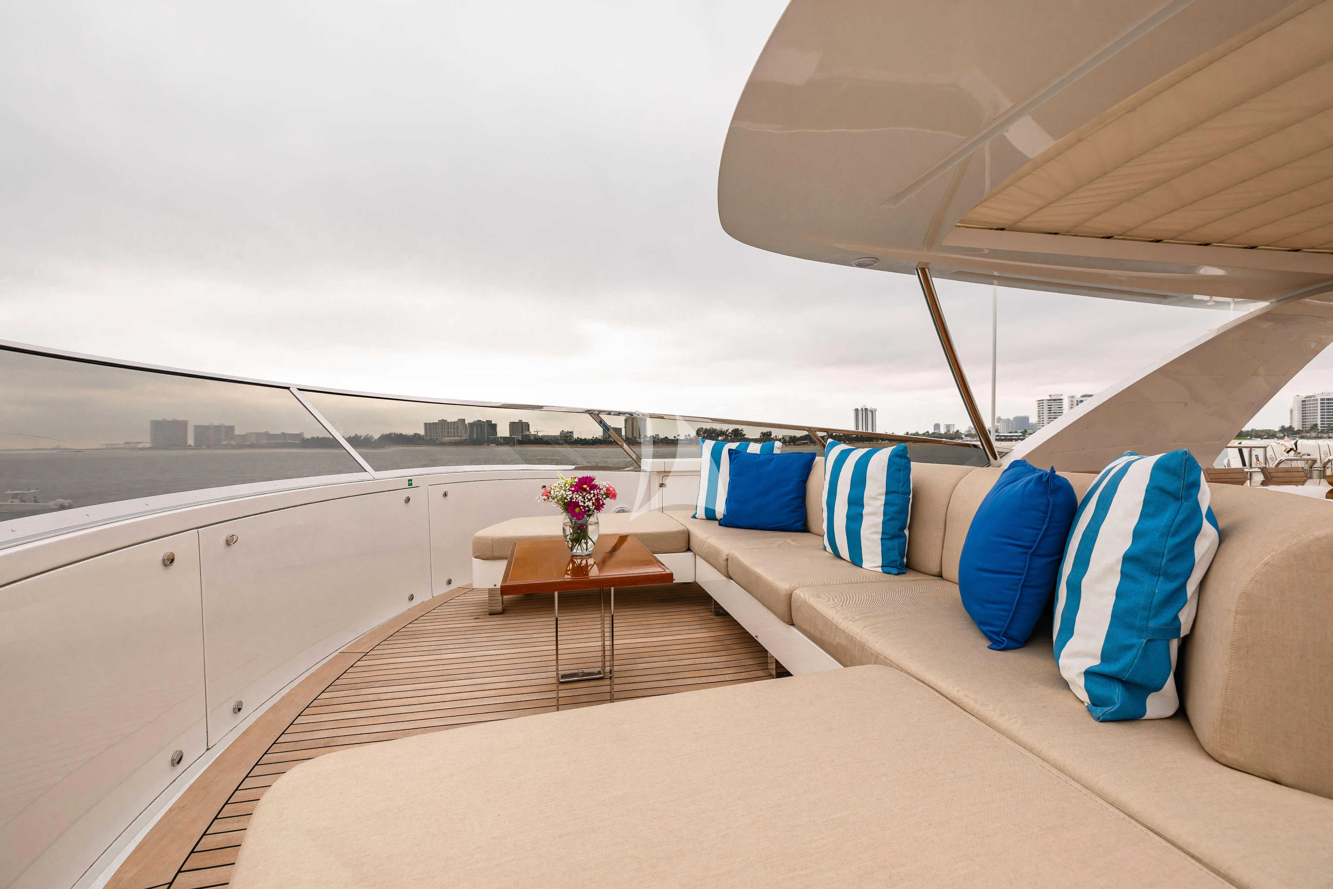a room with a couch and a table aboard PATIENCE Yacht for Charter