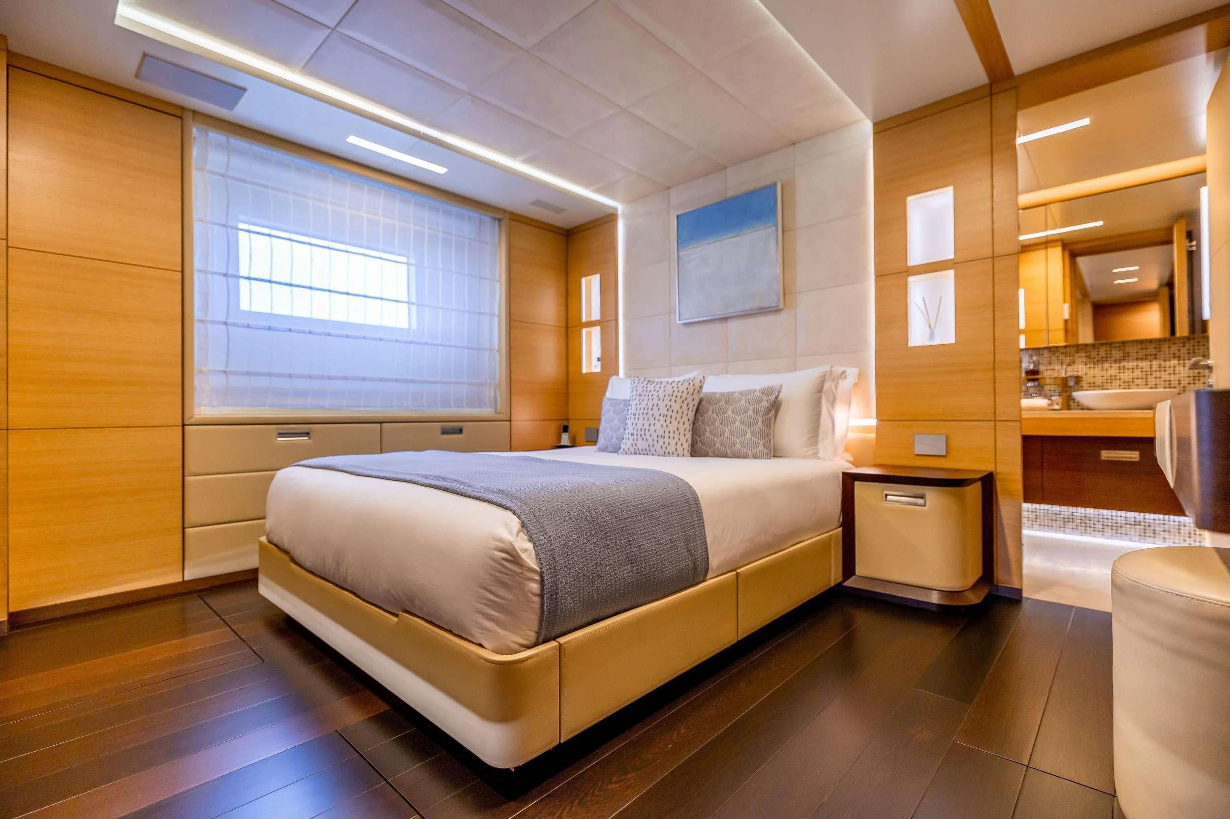 a large bedroom with a bed aboard PATIENCE Yacht for Charter
