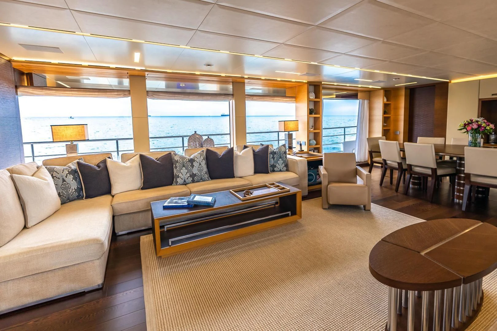 a living room with a large window aboard PATIENCE Yacht for Charter