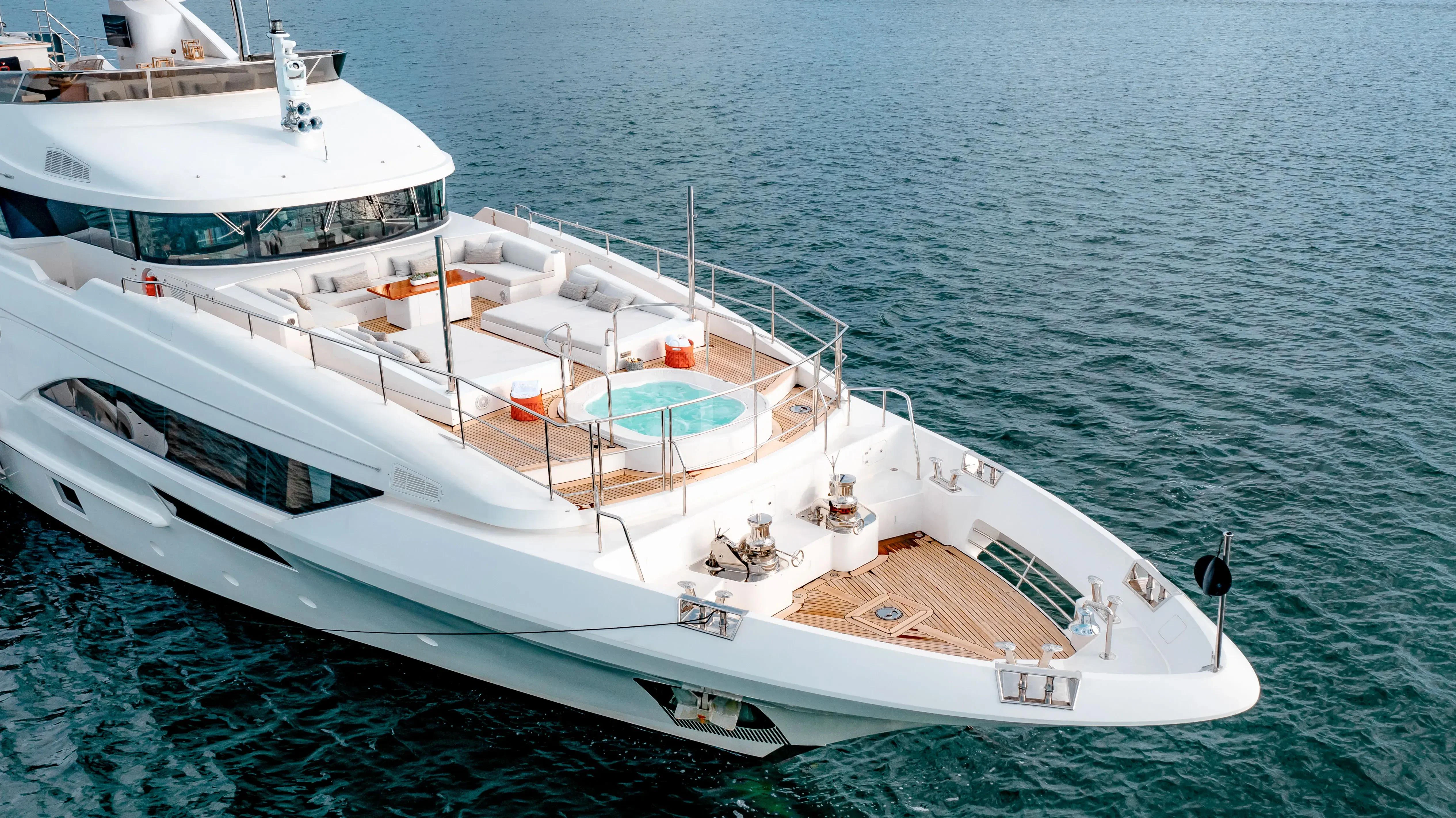 a couple of white boats in the water aboard PATIENCE Yacht for Charter