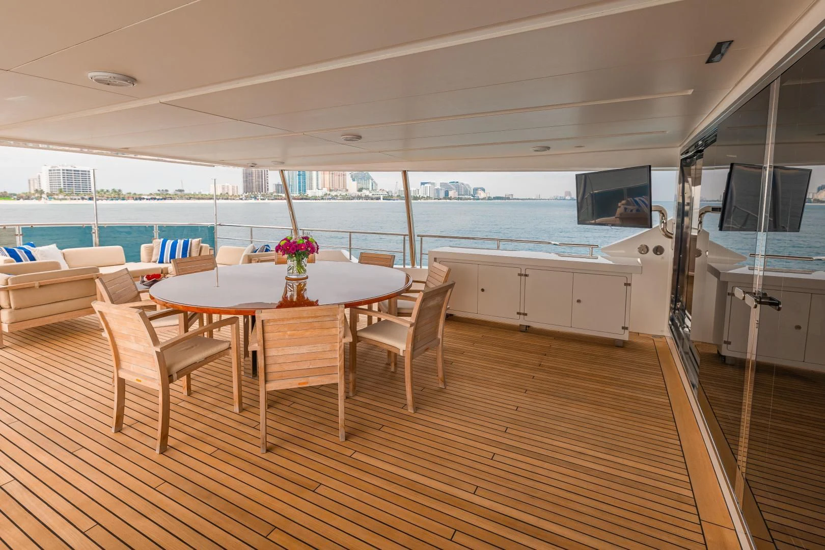 a room with a table and chairs aboard PATIENCE Yacht for Charter