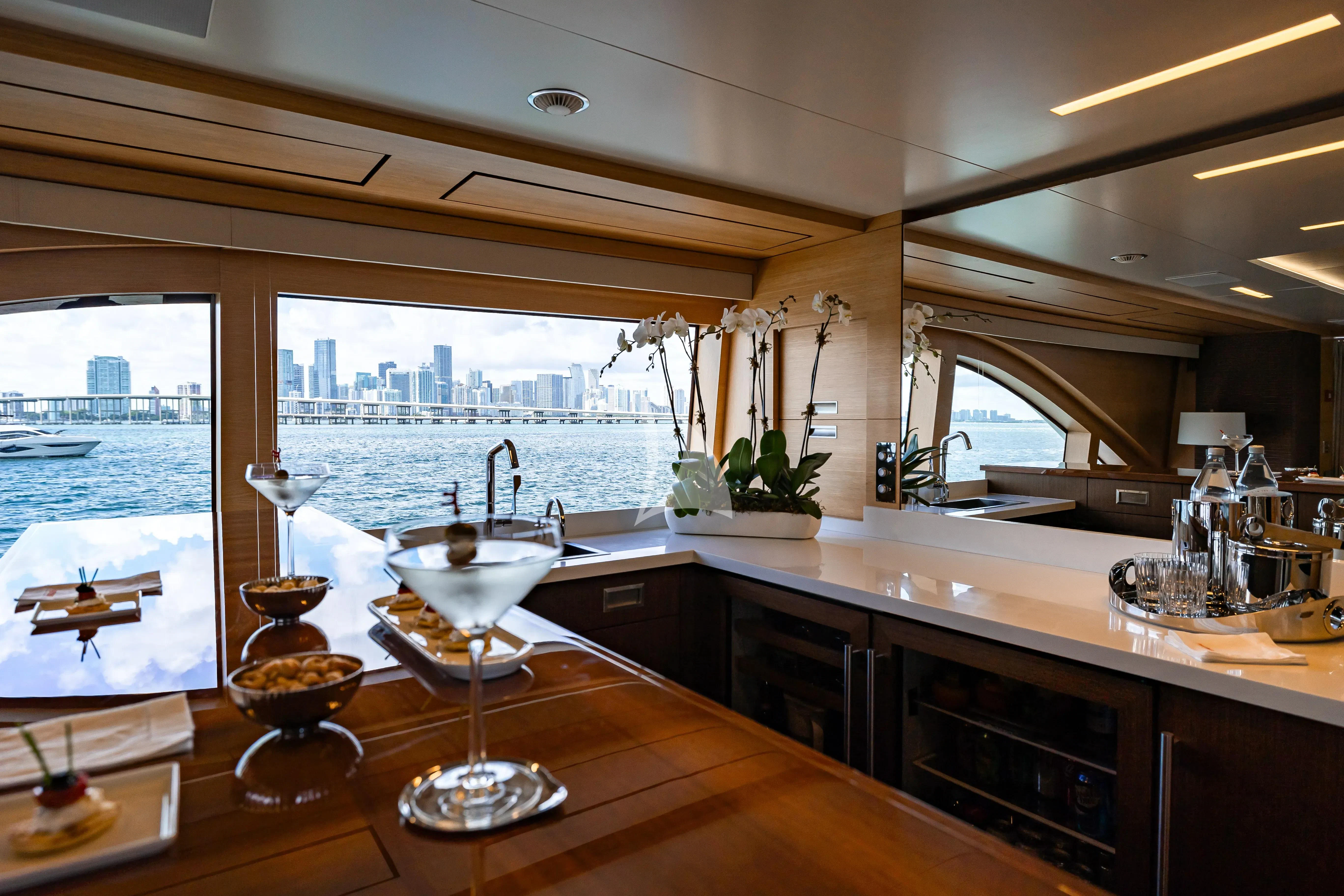 a kitchen with a large window aboard PATIENCE Yacht for Charter