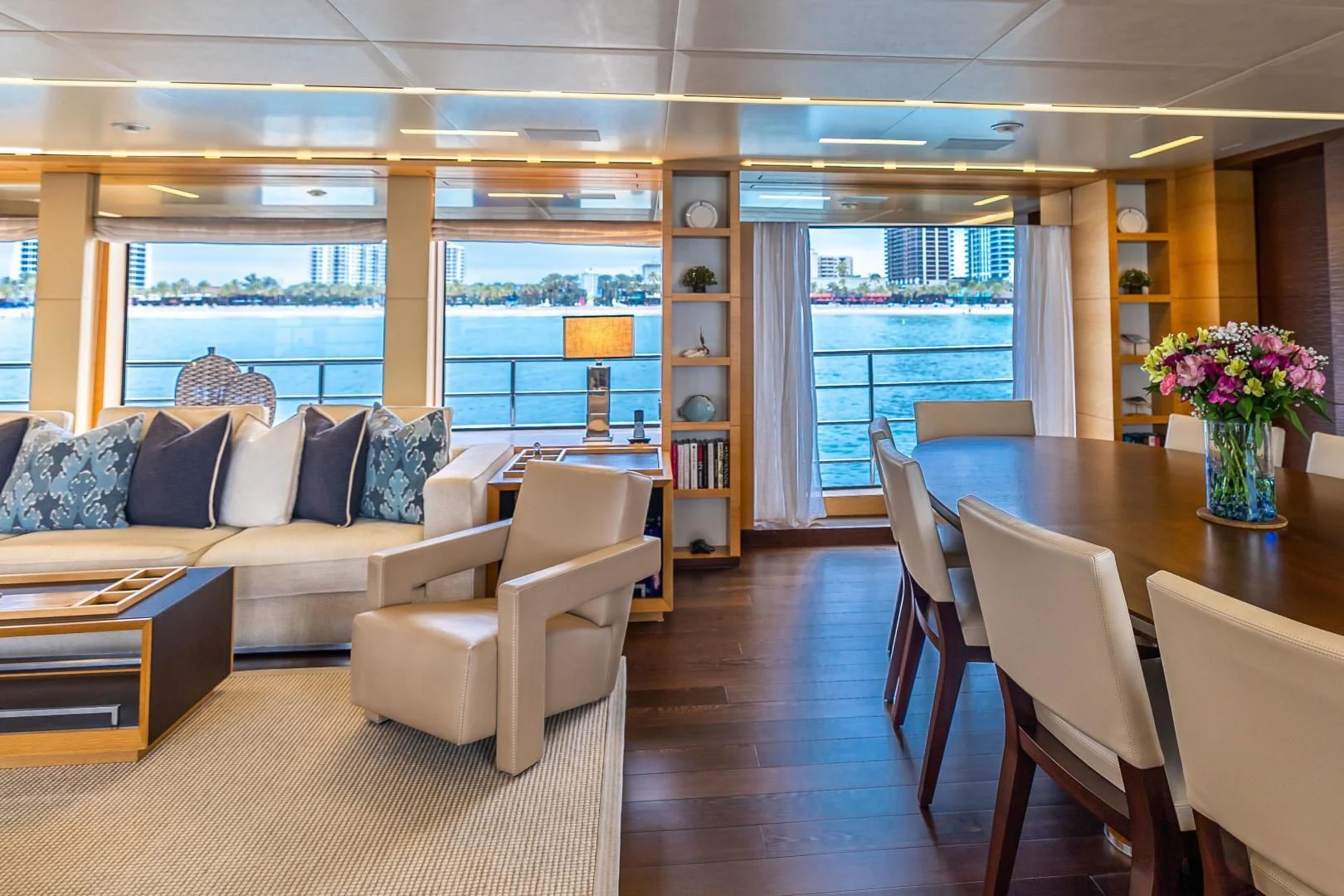 a living room with a table and chairs aboard PATIENCE Yacht for Charter