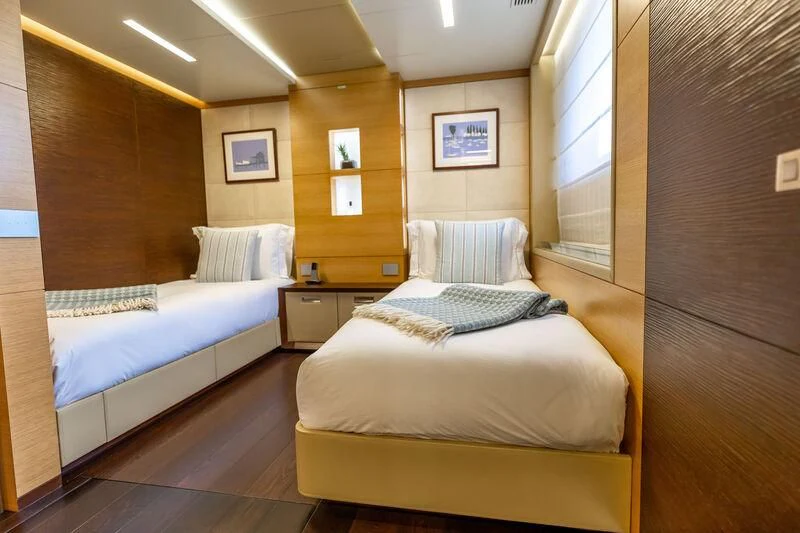 a room with two beds aboard PATIENCE Yacht for Charter