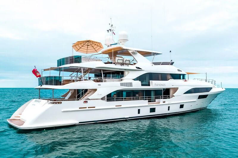 a large white boat in the water aboard PATIENCE Yacht for Charter