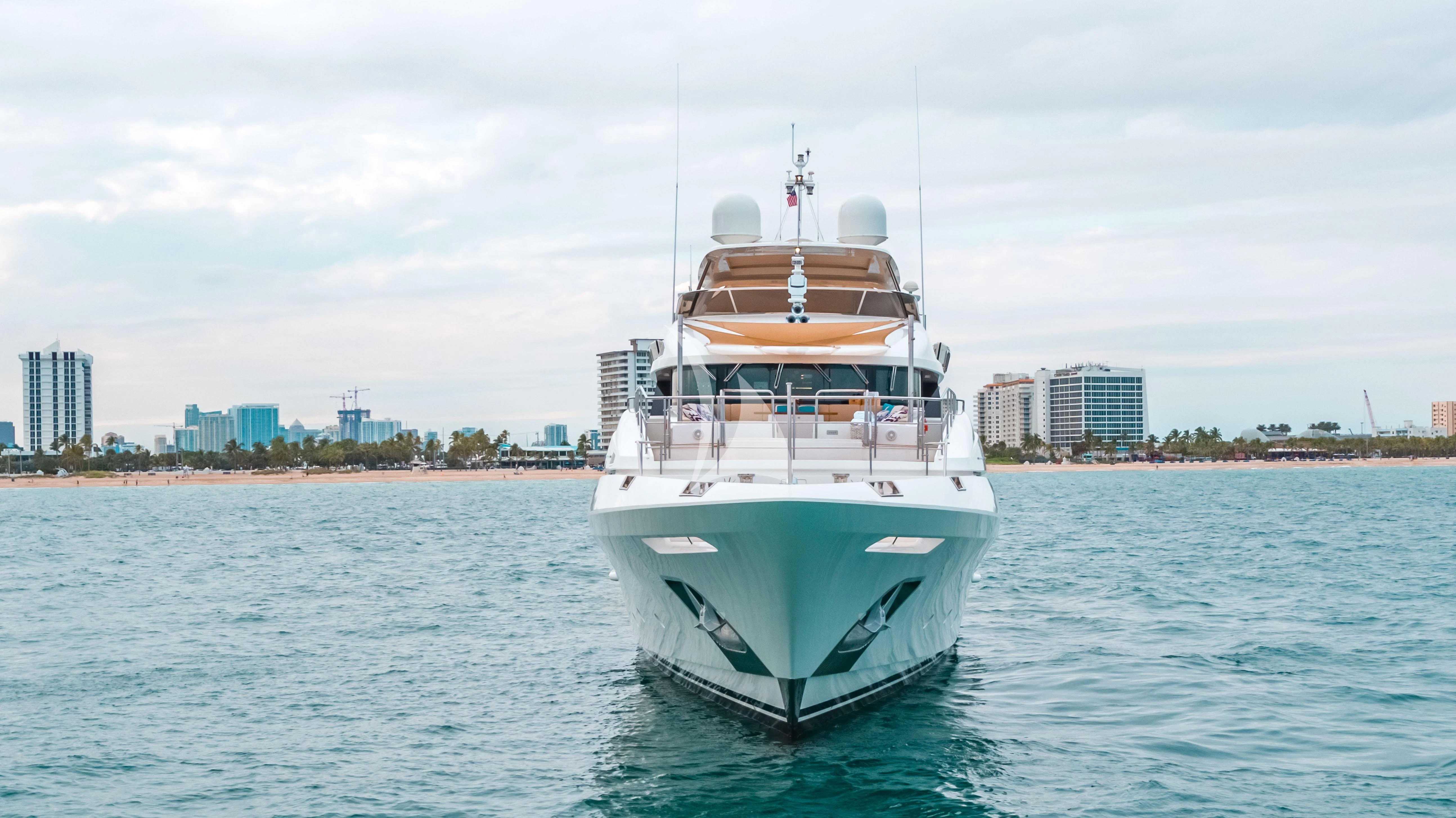 a large white boat in the water aboard PATIENCE Yacht for Charter