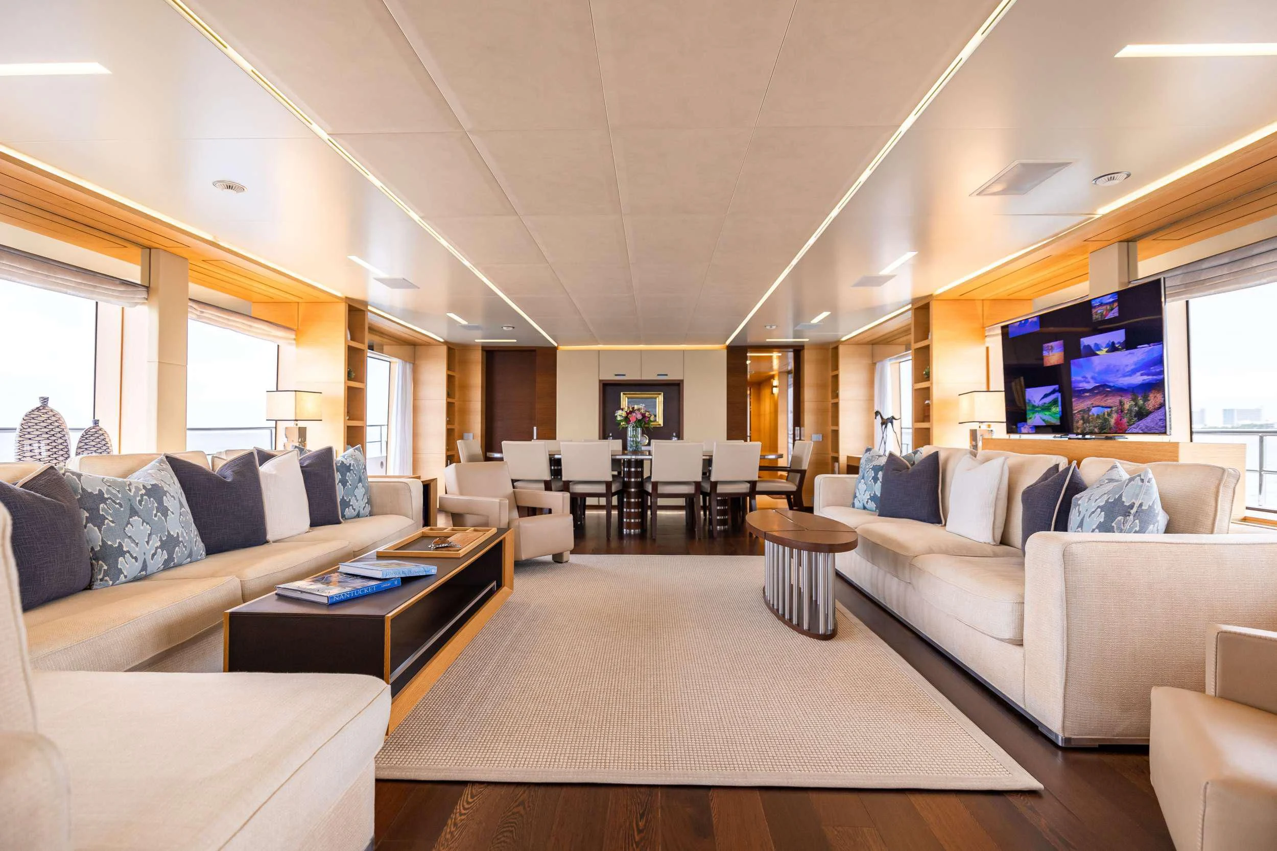 a living room with a large screen aboard PATIENCE Yacht for Charter