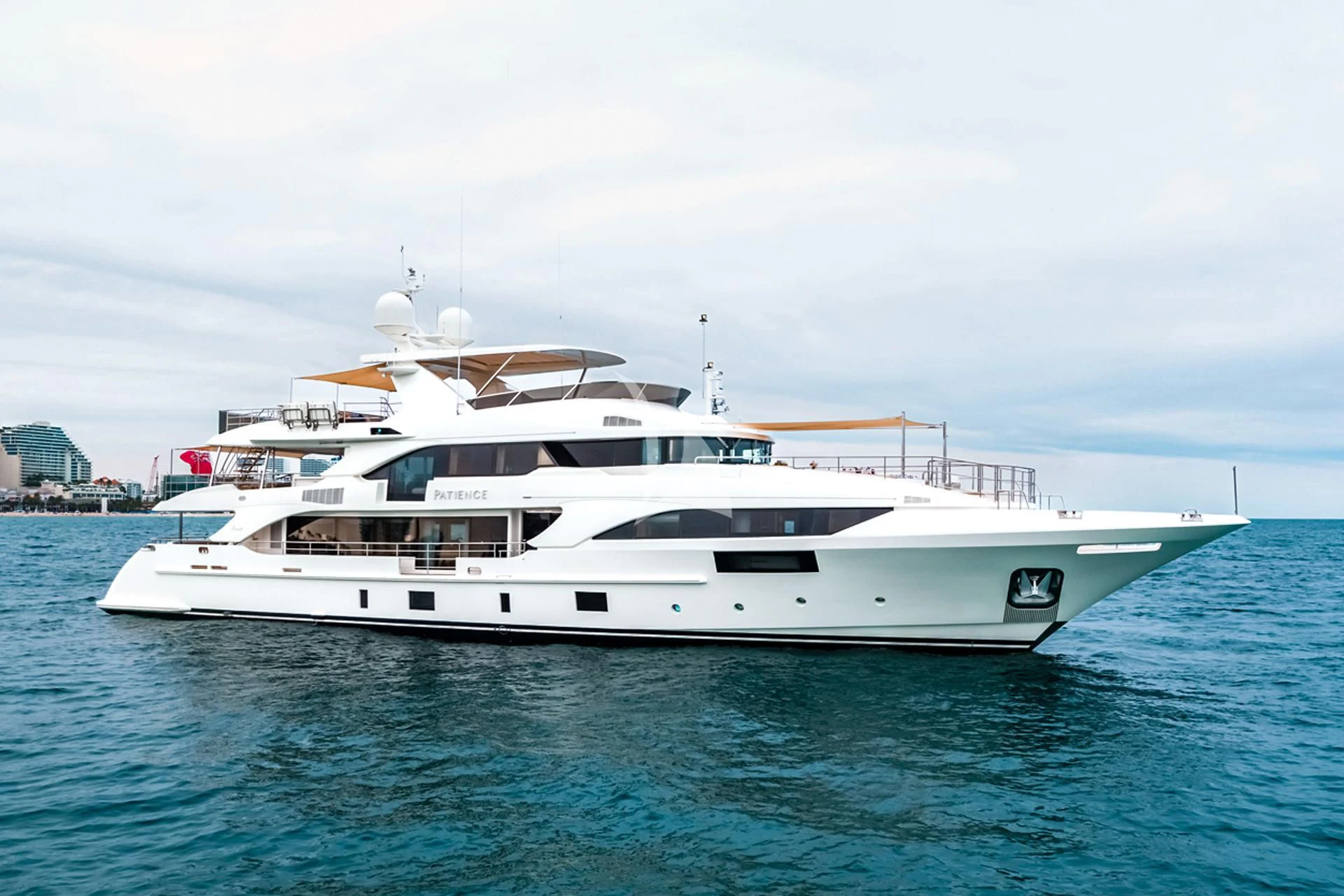 a white yacht in the water aboard PATIENCE Yacht for Charter