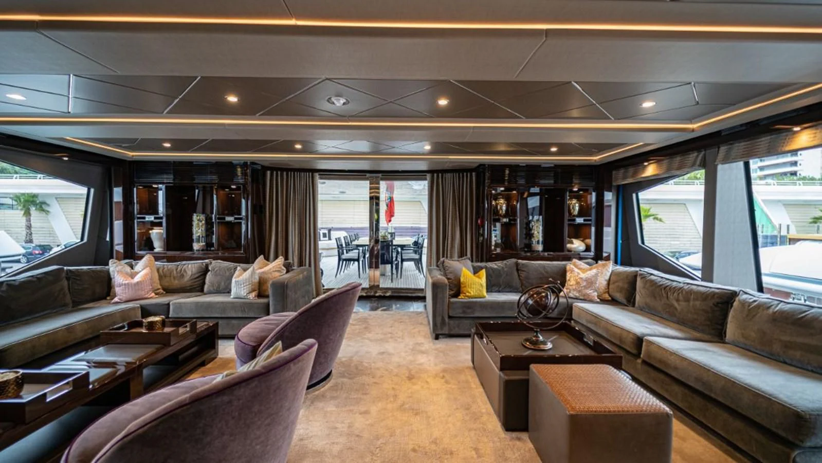 a living room with a couch and a table aboard NEXUS Yacht for Charter
