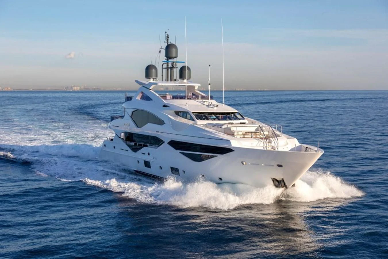 a white yacht on the water aboard NEXUS Yacht for Charter
