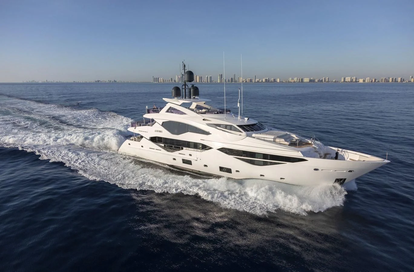 a white yacht on the water aboard NEXUS Yacht for Charter
