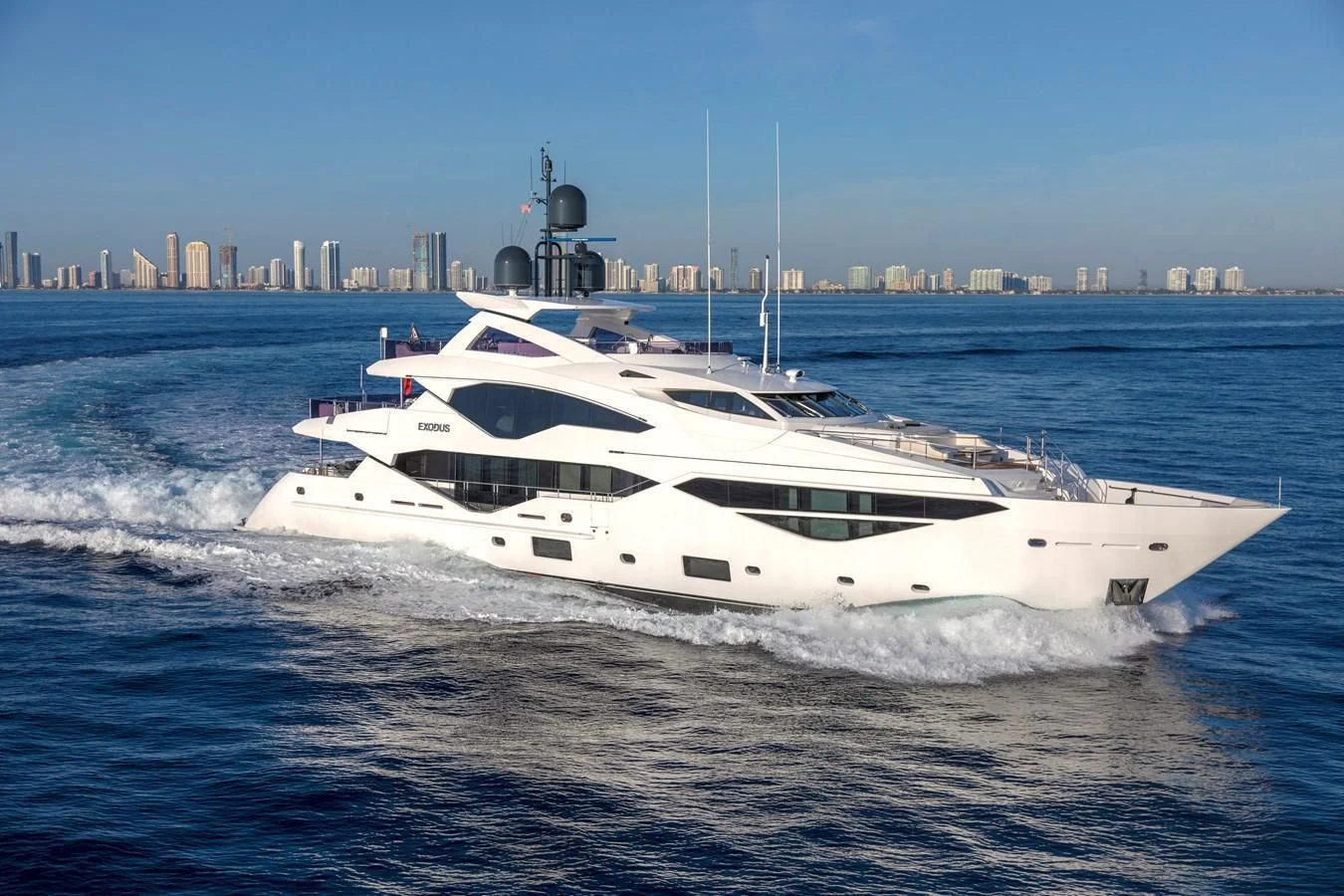a white yacht on the water aboard NEXUS Yacht for Charter