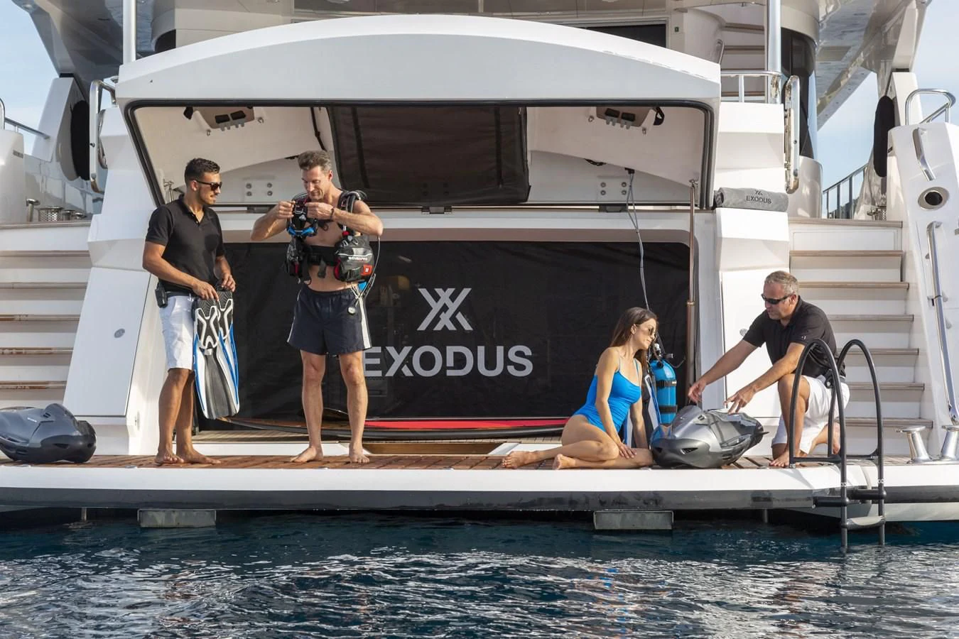 a group of people on a boat aboard NEXUS Yacht for Charter