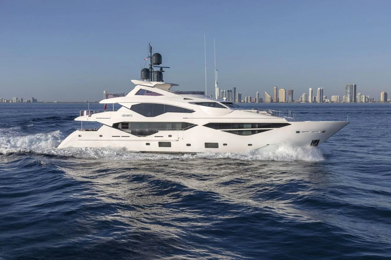 a white yacht on the water aboard NEXUS Yacht for Charter
