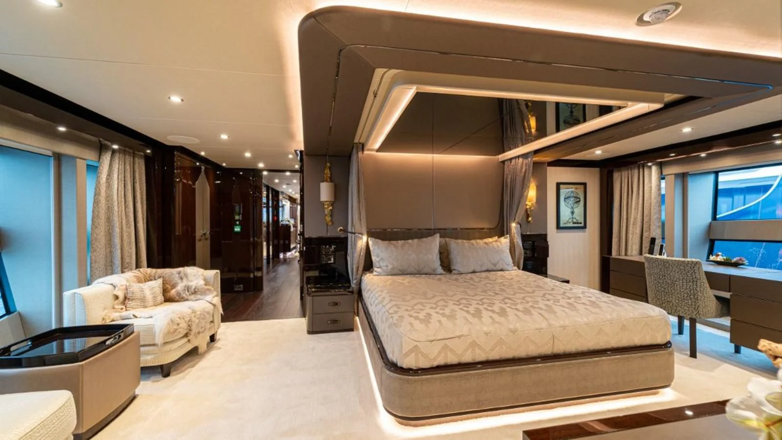 a large bedroom with a large bed aboard NEXUS Yacht for Charter