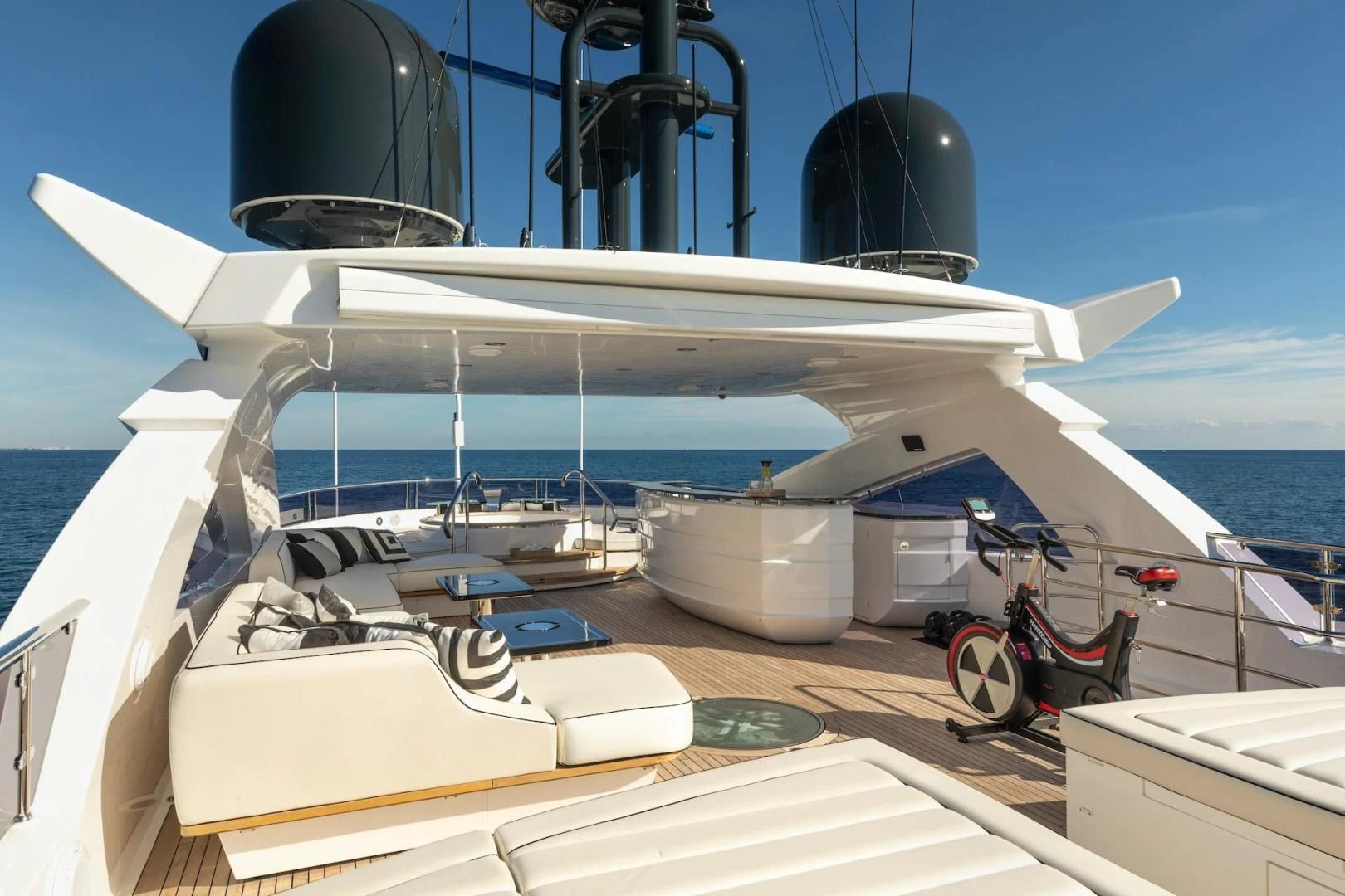 a boat with a satellite dish on the deck aboard NEXUS Yacht for Charter