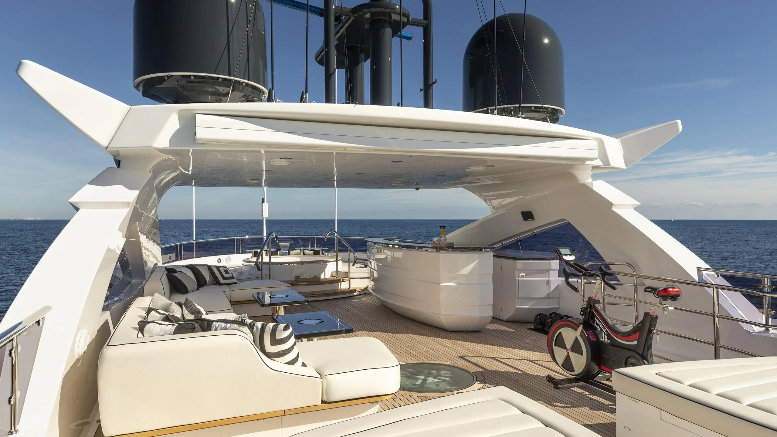 a boat with a satellite dish on the deck aboard NEXUS Yacht for Charter