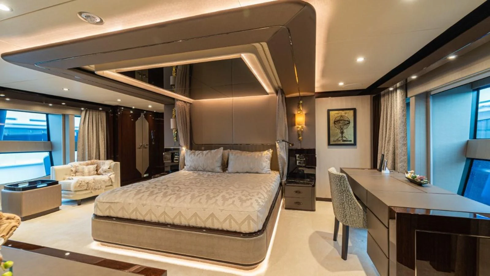 a bedroom with a large bed aboard NEXUS Yacht for Charter