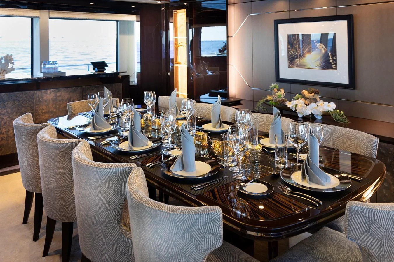 a dining table set for a dinner aboard NEXUS Yacht for Charter