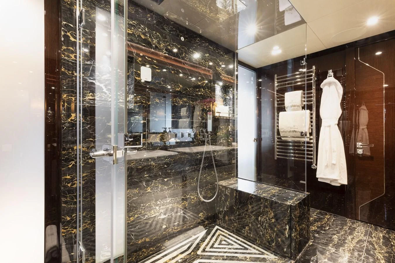 a large display case with a dress from it aboard NEXUS Yacht for Charter