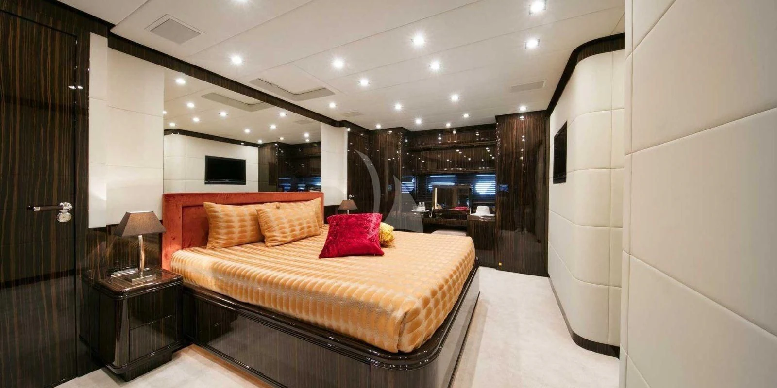 a large bed in a room aboard ATHOS Yacht for Sale