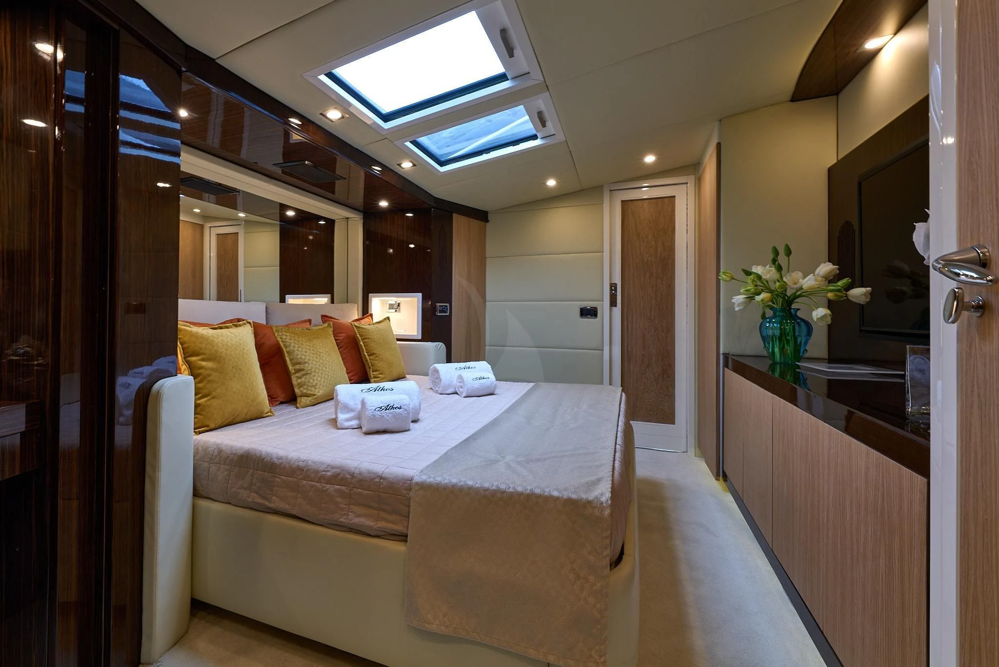 a hotel room with a bed aboard ATHOS Yacht for Sale